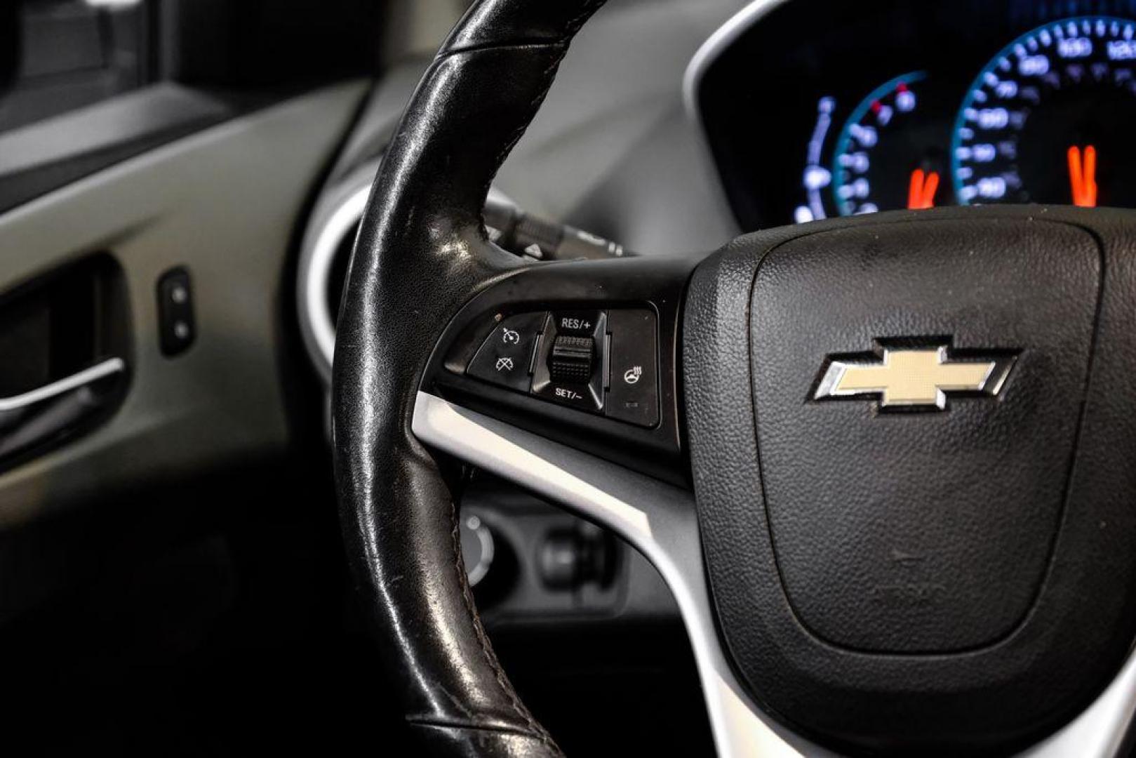 2019 Summit White /Jet Black/Dark Titanium Chevrolet Sonic LT (1G1JD5SB7K4) with an I4 engine, Automatic transmission, located at 15300 Midway Rd., Addison, TX, 75001, (972) 702-0011, 32.958321, -96.838074 - Photo#16