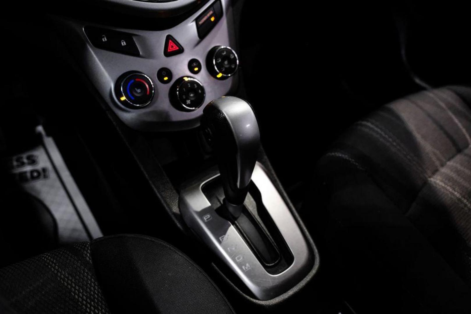 2019 Summit White /Jet Black/Dark Titanium Chevrolet Sonic LT (1G1JD5SB7K4) with an I4 engine, Automatic transmission, located at 15300 Midway Rd., Addison, TX, 75001, (972) 702-0011, 32.958321, -96.838074 - Photo#22