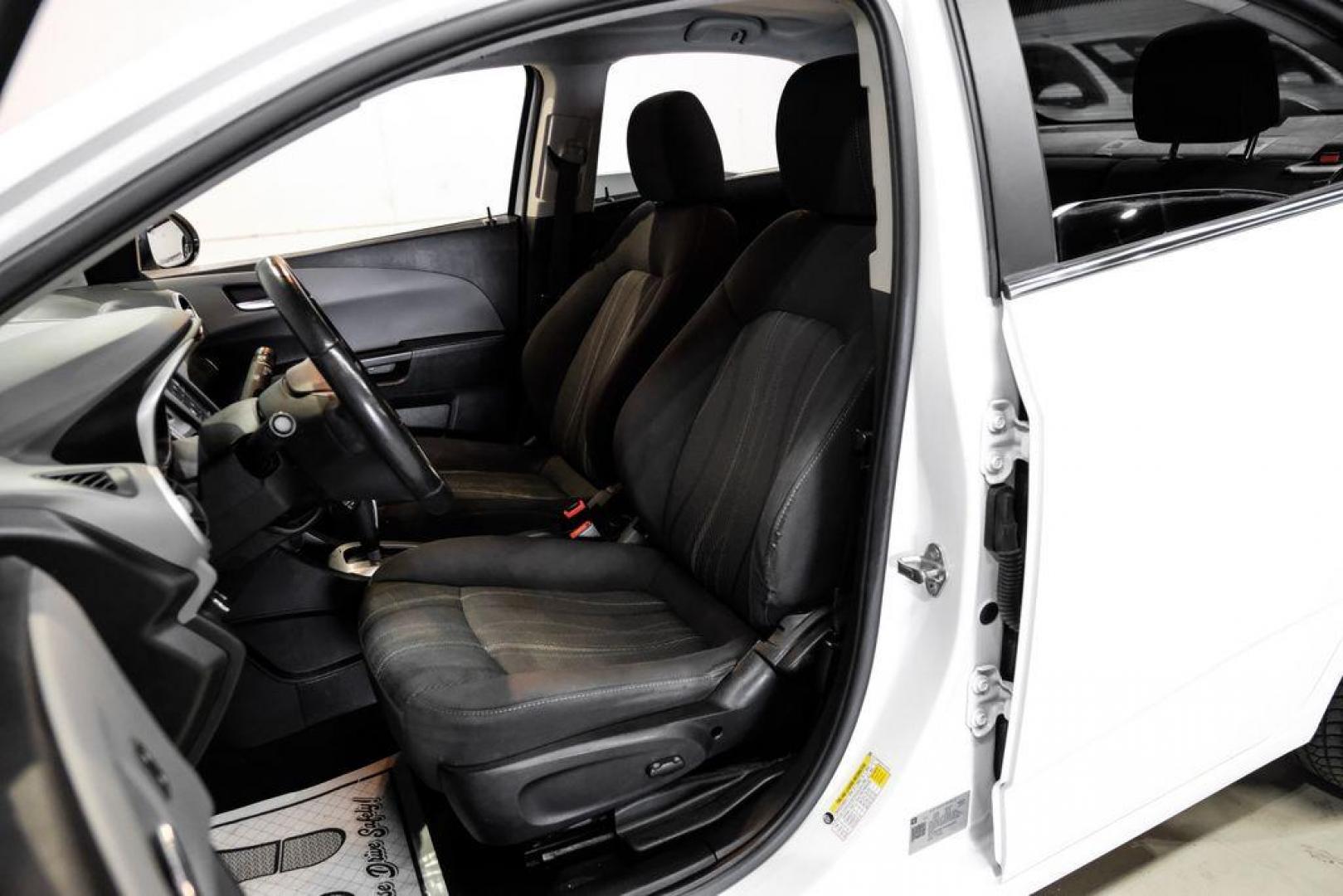 2019 Summit White /Jet Black/Dark Titanium Chevrolet Sonic LT (1G1JD5SB7K4) with an I4 engine, Automatic transmission, located at 15300 Midway Rd., Addison, TX, 75001, (972) 702-0011, 32.958321, -96.838074 - Photo#28