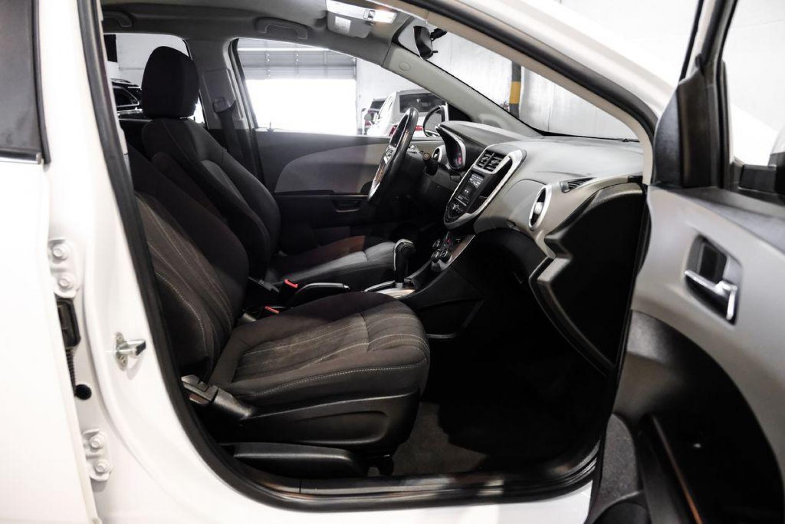 2019 Summit White /Jet Black/Dark Titanium Chevrolet Sonic LT (1G1JD5SB7K4) with an I4 engine, Automatic transmission, located at 15300 Midway Rd., Addison, TX, 75001, (972) 702-0011, 32.958321, -96.838074 - Photo#31