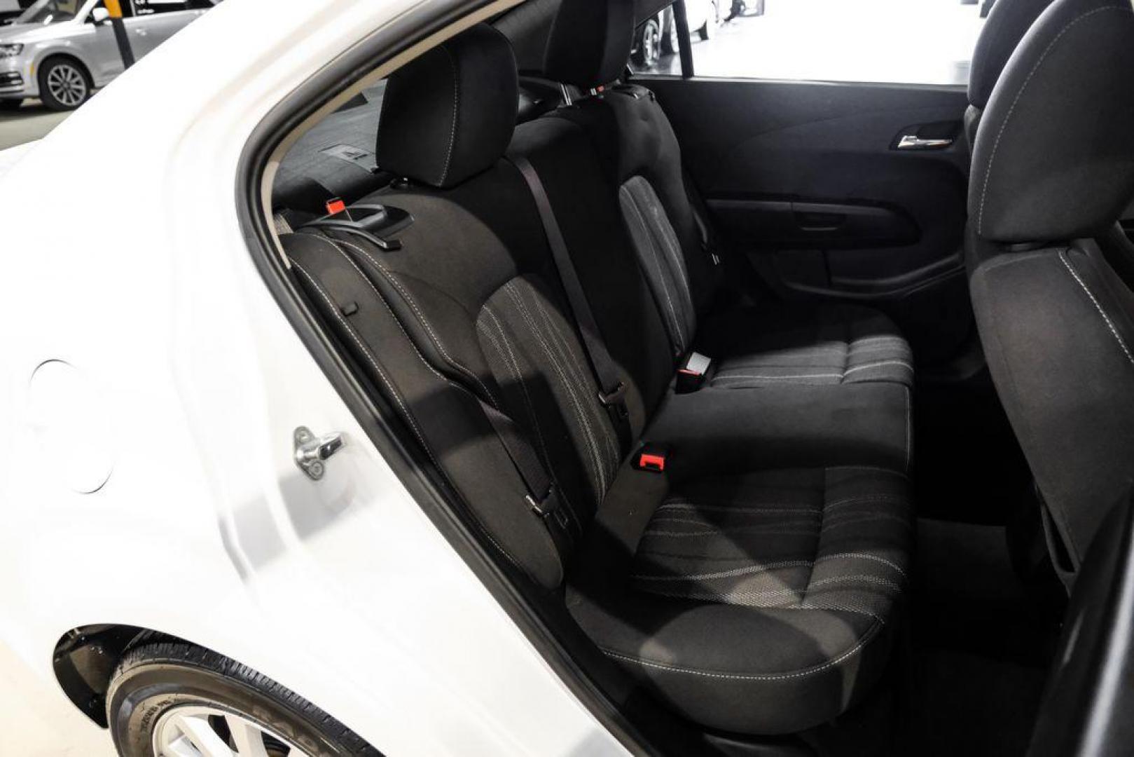 2019 Summit White /Jet Black/Dark Titanium Chevrolet Sonic LT (1G1JD5SB7K4) with an I4 engine, Automatic transmission, located at 15300 Midway Rd., Addison, TX, 75001, (972) 702-0011, 32.958321, -96.838074 - Photo#32