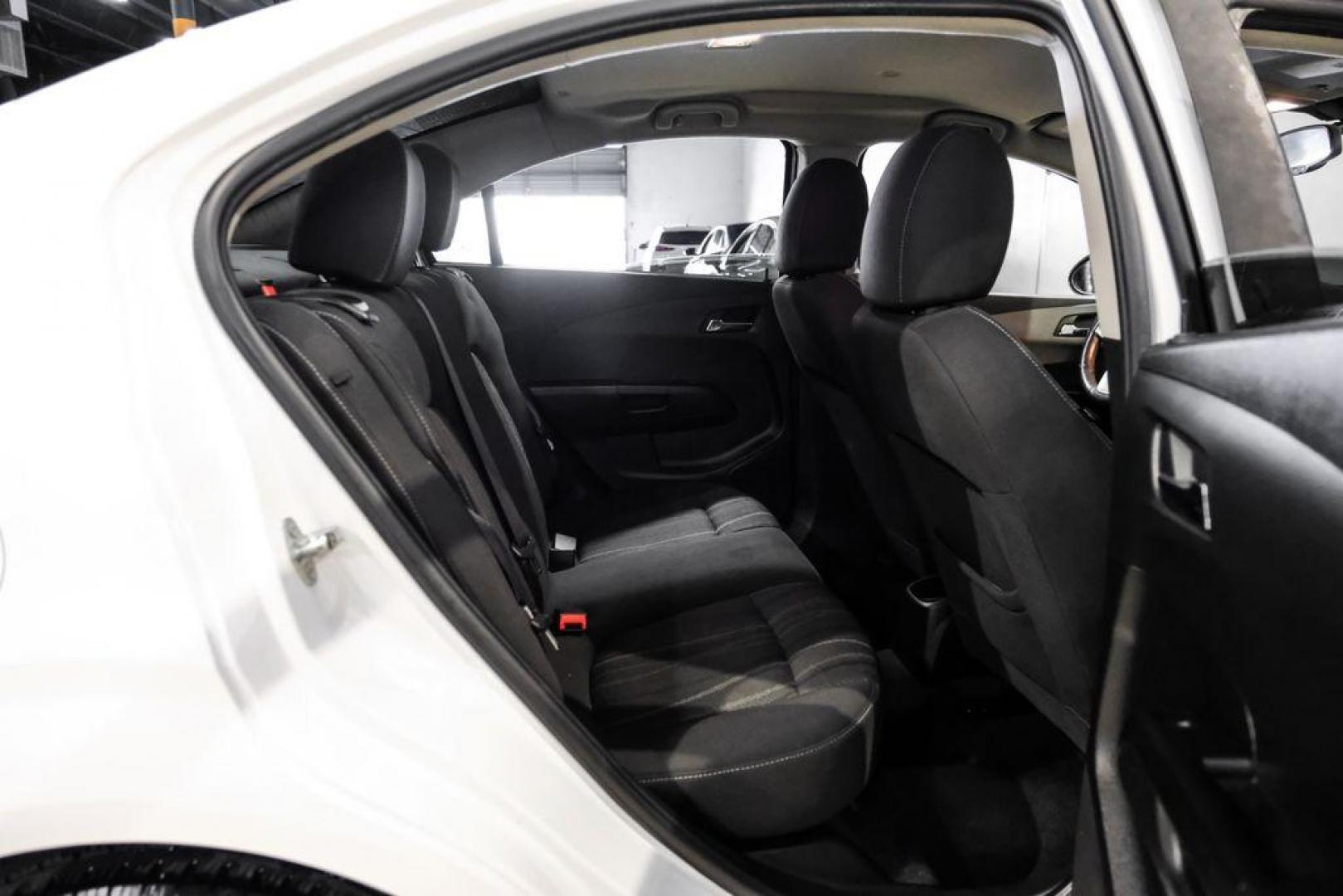 2019 Summit White /Jet Black/Dark Titanium Chevrolet Sonic LT (1G1JD5SB7K4) with an I4 engine, Automatic transmission, located at 15300 Midway Rd., Addison, TX, 75001, (972) 702-0011, 32.958321, -96.838074 - Photo#33