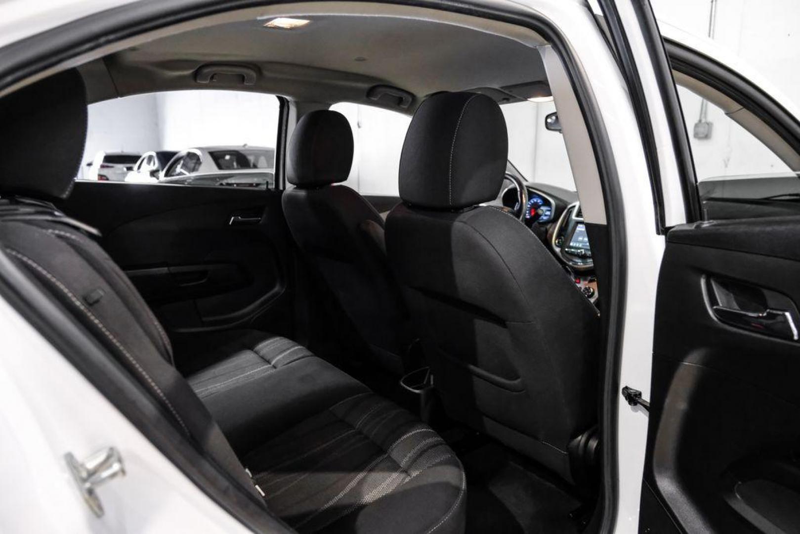 2019 Summit White /Jet Black/Dark Titanium Chevrolet Sonic LT (1G1JD5SB7K4) with an I4 engine, Automatic transmission, located at 15300 Midway Rd., Addison, TX, 75001, (972) 702-0011, 32.958321, -96.838074 - Photo#34