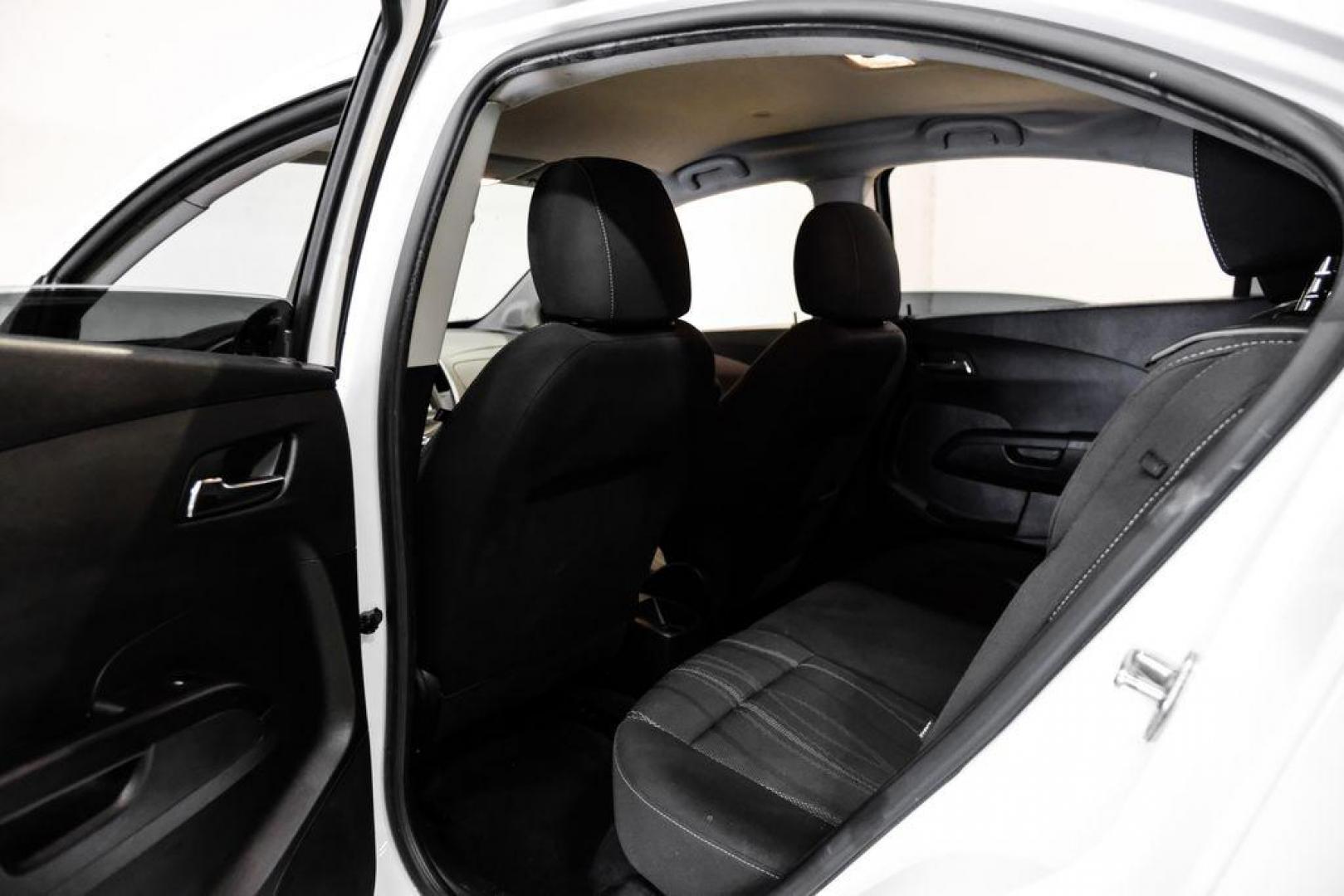 2019 Summit White /Jet Black/Dark Titanium Chevrolet Sonic LT (1G1JD5SB7K4) with an I4 engine, Automatic transmission, located at 15300 Midway Rd., Addison, TX, 75001, (972) 702-0011, 32.958321, -96.838074 - Photo#35