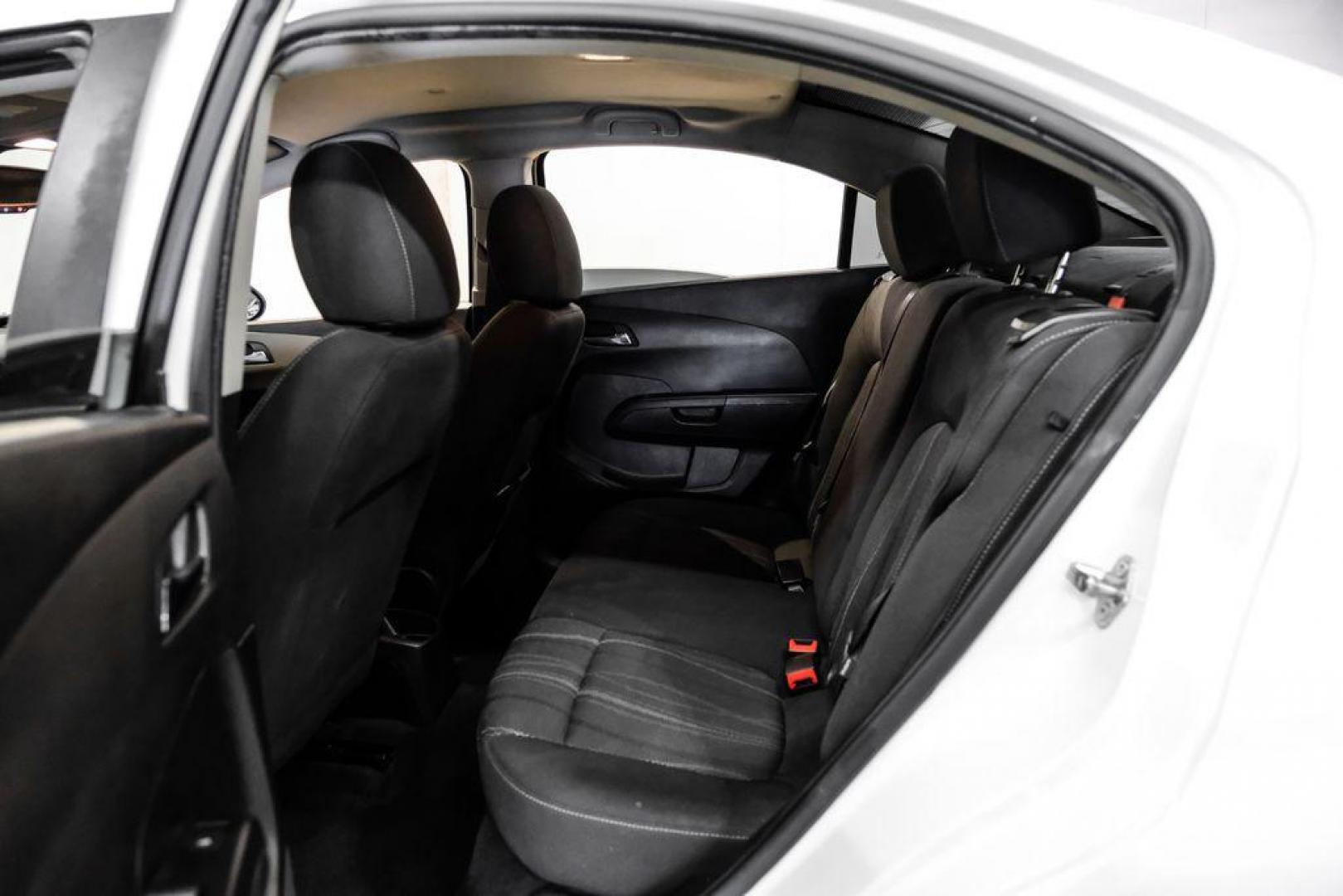 2019 Summit White /Jet Black/Dark Titanium Chevrolet Sonic LT (1G1JD5SB7K4) with an I4 engine, Automatic transmission, located at 15300 Midway Rd., Addison, TX, 75001, (972) 702-0011, 32.958321, -96.838074 - Photo#36