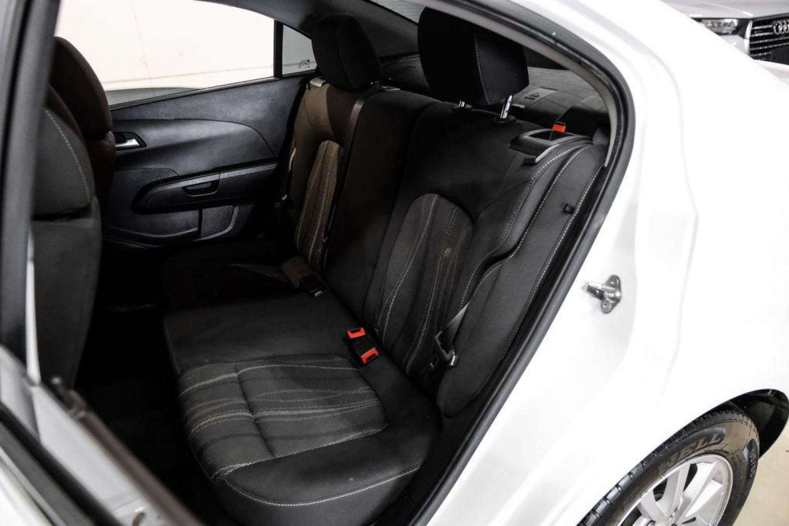 2019 Summit White /Jet Black/Dark Titanium Chevrolet Sonic LT (1G1JD5SB7K4) with an I4 engine, Automatic transmission, located at 15300 Midway Rd., Addison, TX, 75001, (972) 702-0011, 32.958321, -96.838074 - Photo#37