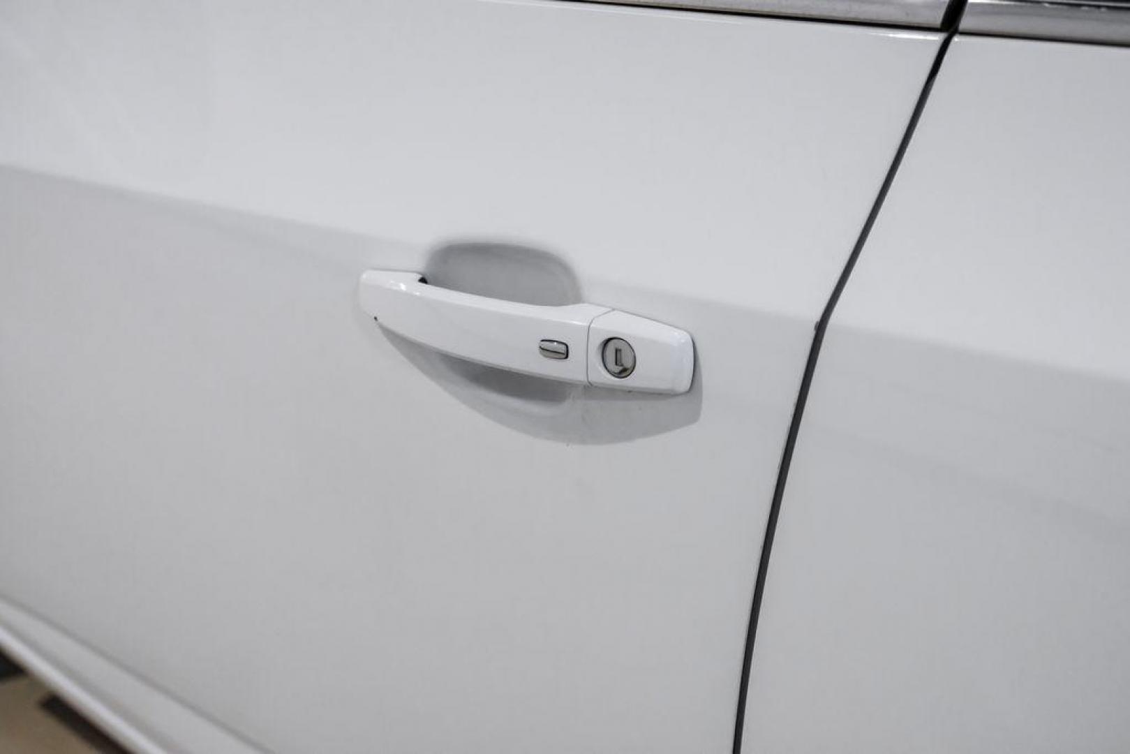 2019 Summit White /Jet Black/Dark Titanium Chevrolet Sonic LT (1G1JD5SB7K4) with an I4 engine, Automatic transmission, located at 15300 Midway Rd., Addison, TX, 75001, (972) 702-0011, 32.958321, -96.838074 - Photo#38