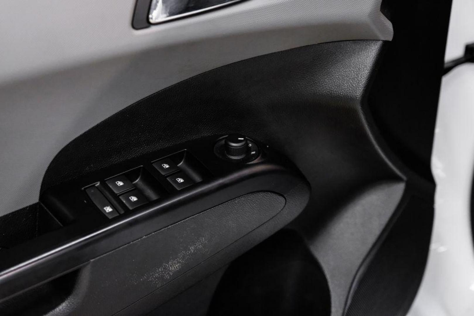 2019 Summit White /Jet Black/Dark Titanium Chevrolet Sonic LT (1G1JD5SB7K4) with an I4 engine, Automatic transmission, located at 15300 Midway Rd., Addison, TX, 75001, (972) 702-0011, 32.958321, -96.838074 - Photo#41