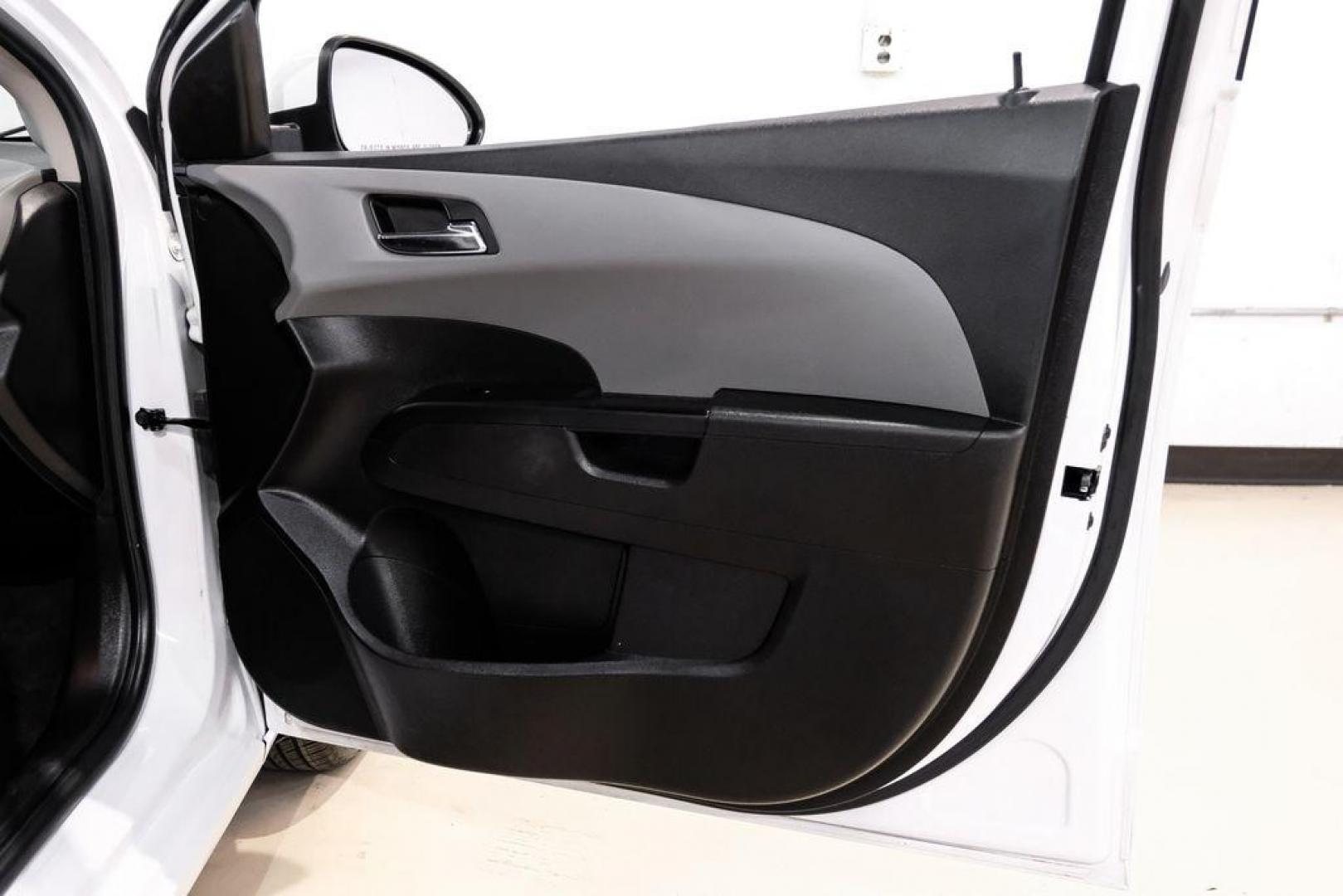 2019 Summit White /Jet Black/Dark Titanium Chevrolet Sonic LT (1G1JD5SB7K4) with an I4 engine, Automatic transmission, located at 15300 Midway Rd., Addison, TX, 75001, (972) 702-0011, 32.958321, -96.838074 - Photo#42