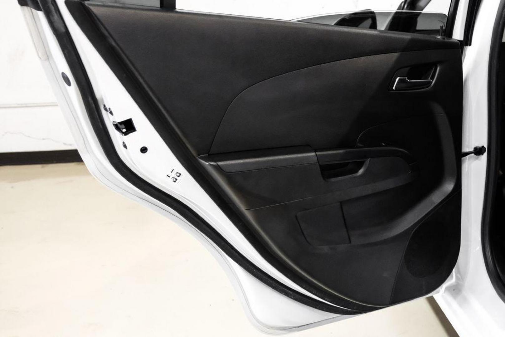 2019 Summit White /Jet Black/Dark Titanium Chevrolet Sonic LT (1G1JD5SB7K4) with an I4 engine, Automatic transmission, located at 15300 Midway Rd., Addison, TX, 75001, (972) 702-0011, 32.958321, -96.838074 - Photo#43