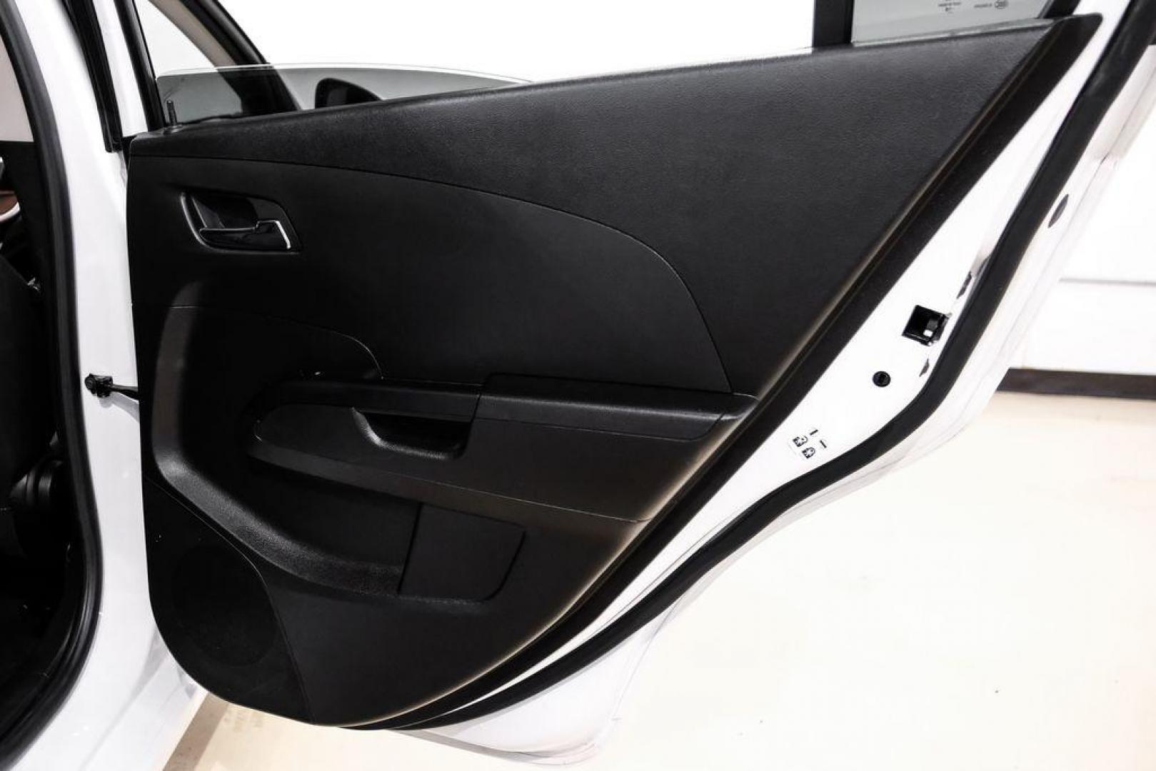 2019 Summit White /Jet Black/Dark Titanium Chevrolet Sonic LT (1G1JD5SB7K4) with an I4 engine, Automatic transmission, located at 15300 Midway Rd., Addison, TX, 75001, (972) 702-0011, 32.958321, -96.838074 - Photo#44