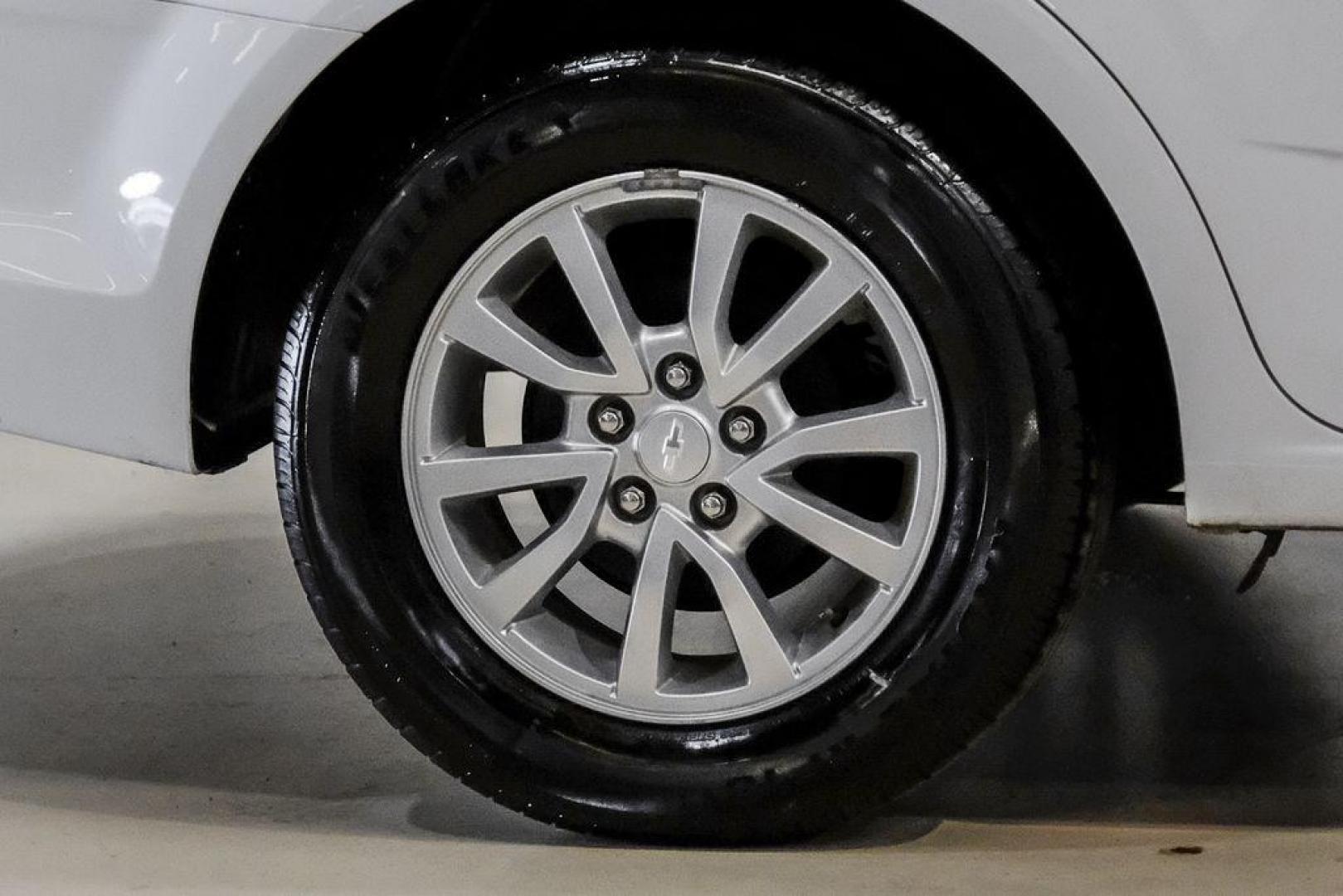 2019 Summit White /Jet Black/Dark Titanium Chevrolet Sonic LT (1G1JD5SB7K4) with an I4 engine, Automatic transmission, located at 15300 Midway Rd., Addison, TX, 75001, (972) 702-0011, 32.958321, -96.838074 - Photo#52