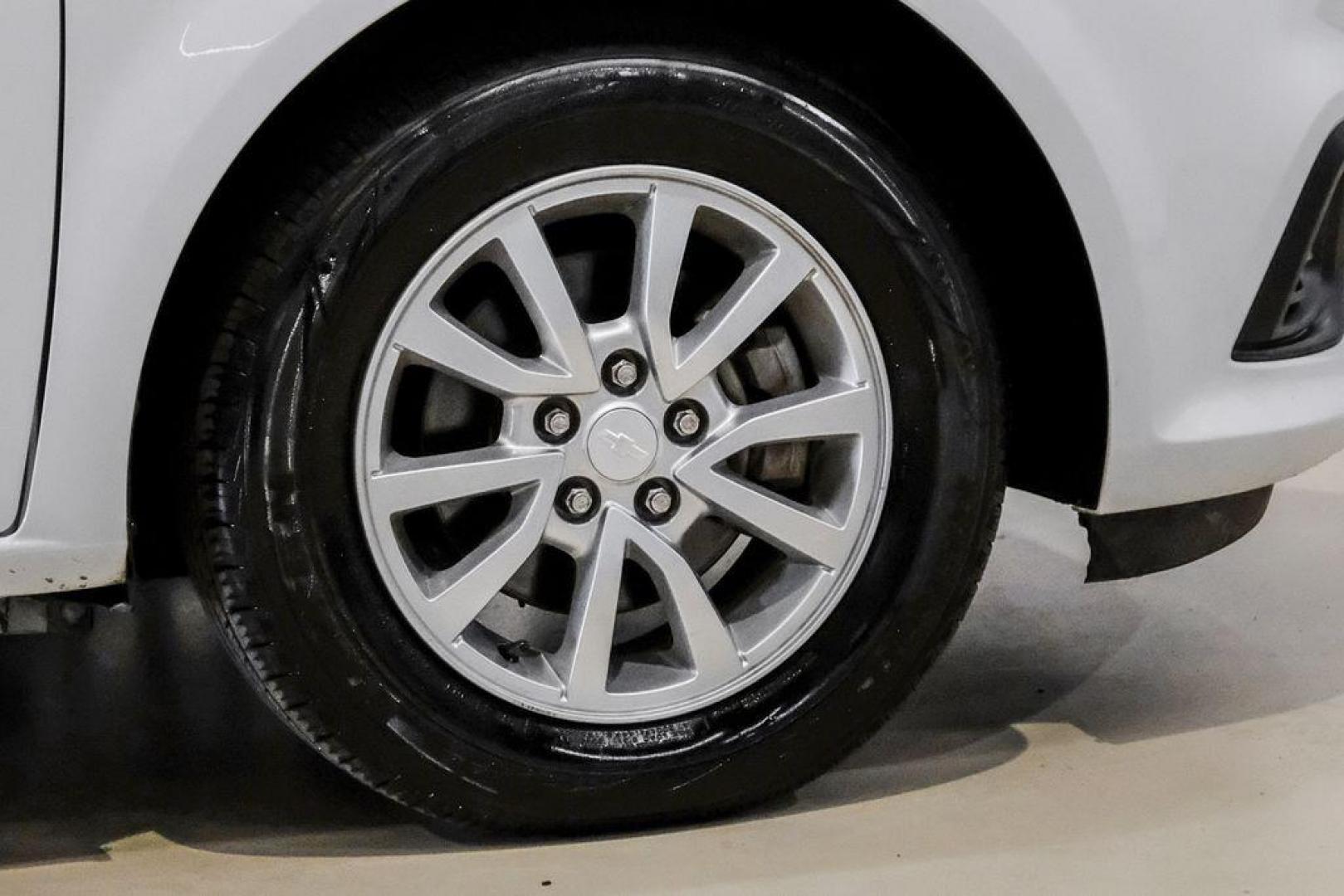 2019 Summit White /Jet Black/Dark Titanium Chevrolet Sonic LT (1G1JD5SB7K4) with an I4 engine, Automatic transmission, located at 15300 Midway Rd., Addison, TX, 75001, (972) 702-0011, 32.958321, -96.838074 - Photo#53