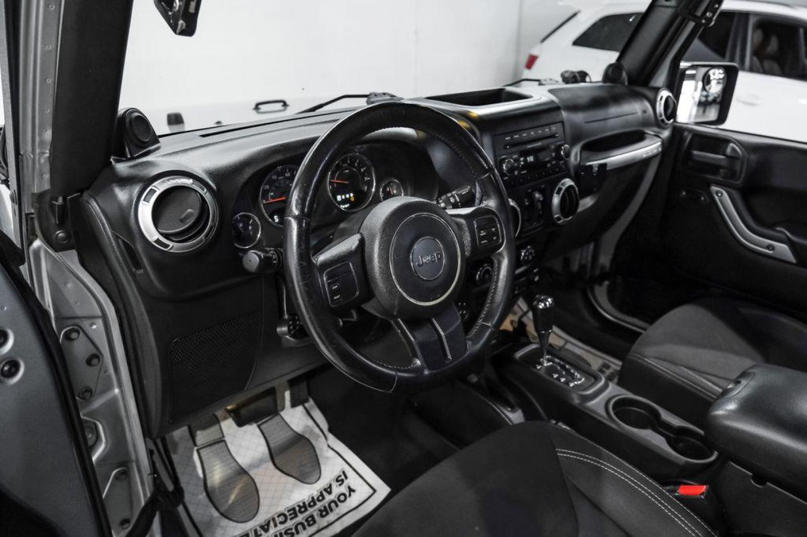 2013 Billet Metallic Clearcoat /Black Interior Jeep Wrangler Unlimited Sahara (1C4BJWEG8DL) with an 3.6L V6 24V VVT engine, Automatic transmission, located at 15300 Midway Rd., Addison, TX, 75001, (972) 702-0011, 32.958321, -96.838074 - Photo#2