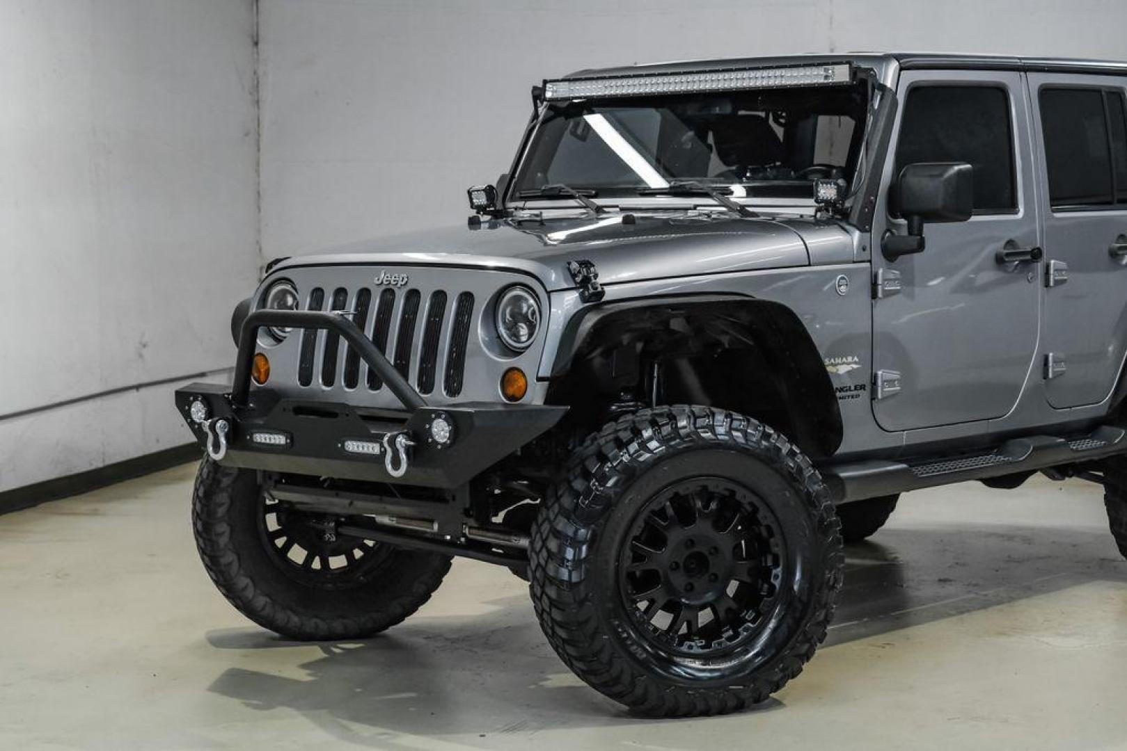 2013 Billet Metallic Clearcoat /Black Interior Jeep Wrangler Unlimited Sahara (1C4BJWEG8DL) with an 3.6L V6 24V VVT engine, Automatic transmission, located at 15300 Midway Rd., Addison, TX, 75001, (972) 702-0011, 32.958321, -96.838074 - Photo#4