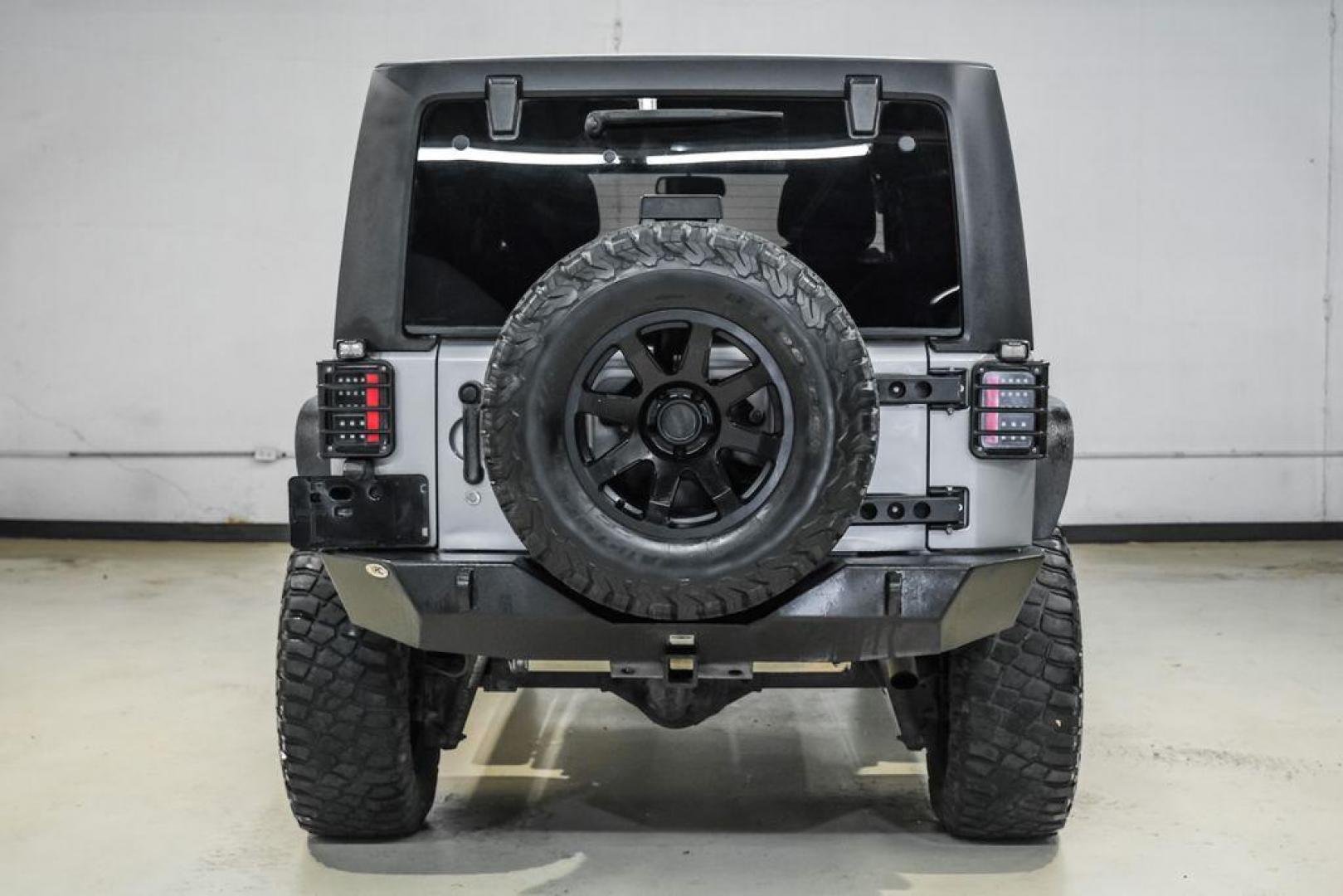 2013 Billet Metallic Clearcoat /Black Interior Jeep Wrangler Unlimited Sahara (1C4BJWEG8DL) with an 3.6L V6 24V VVT engine, Automatic transmission, located at 15300 Midway Rd., Addison, TX, 75001, (972) 702-0011, 32.958321, -96.838074 - Photo#10