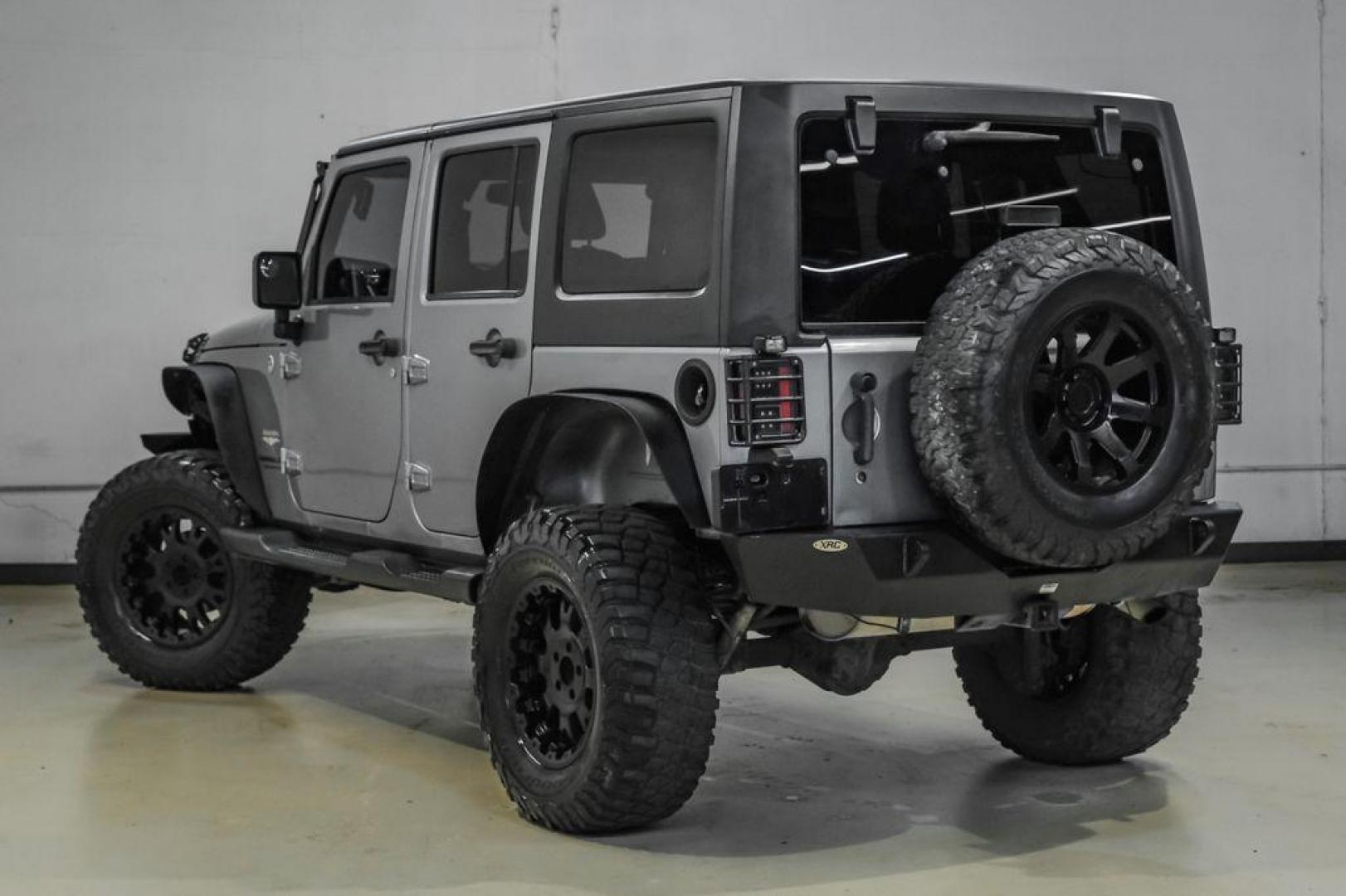 2013 Billet Metallic Clearcoat /Black Interior Jeep Wrangler Unlimited Sahara (1C4BJWEG8DL) with an 3.6L V6 24V VVT engine, Automatic transmission, located at 15300 Midway Rd., Addison, TX, 75001, (972) 702-0011, 32.958321, -96.838074 - Photo#11