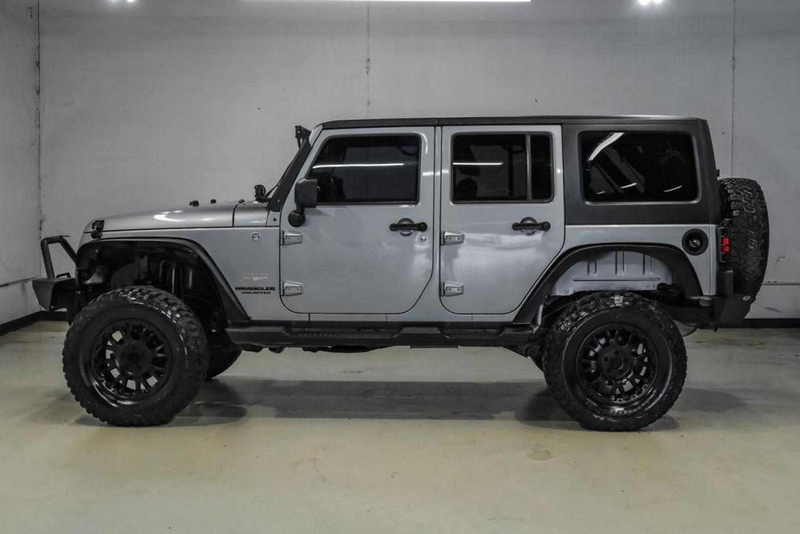 2013 Billet Metallic Clearcoat /Black Interior Jeep Wrangler Unlimited Sahara (1C4BJWEG8DL) with an 3.6L V6 24V VVT engine, Automatic transmission, located at 15300 Midway Rd., Addison, TX, 75001, (972) 702-0011, 32.958321, -96.838074 - Photo#14