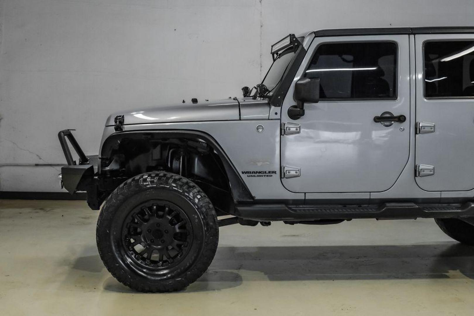 2013 Billet Metallic Clearcoat /Black Interior Jeep Wrangler Unlimited Sahara (1C4BJWEG8DL) with an 3.6L V6 24V VVT engine, Automatic transmission, located at 15300 Midway Rd., Addison, TX, 75001, (972) 702-0011, 32.958321, -96.838074 - Photo#15