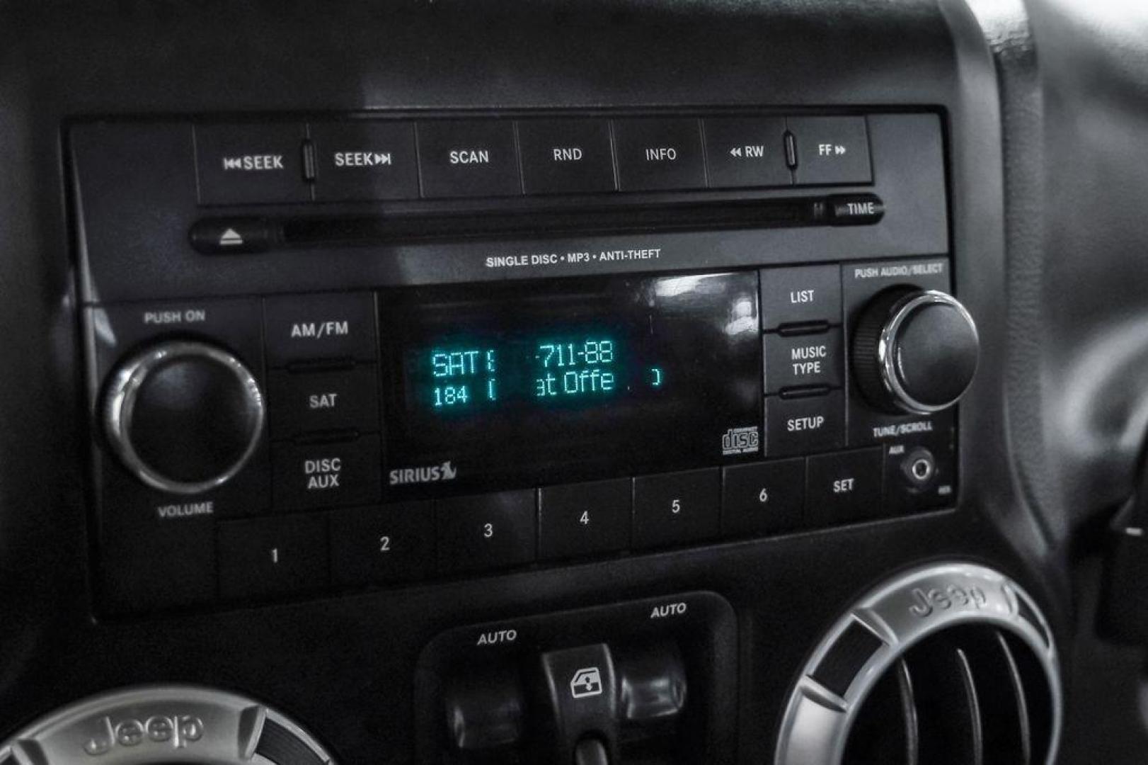 2013 Billet Metallic Clearcoat /Black Interior Jeep Wrangler Unlimited Sahara (1C4BJWEG8DL) with an 3.6L V6 24V VVT engine, Automatic transmission, located at 15300 Midway Rd., Addison, TX, 75001, (972) 702-0011, 32.958321, -96.838074 - Photo#28