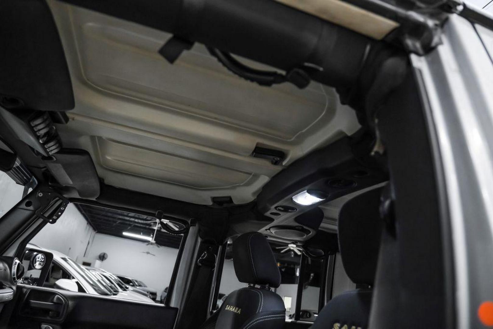 2013 Billet Metallic Clearcoat /Black Interior Jeep Wrangler Unlimited Sahara (1C4BJWEG8DL) with an 3.6L V6 24V VVT engine, Automatic transmission, located at 15300 Midway Rd., Addison, TX, 75001, (972) 702-0011, 32.958321, -96.838074 - Photo#29