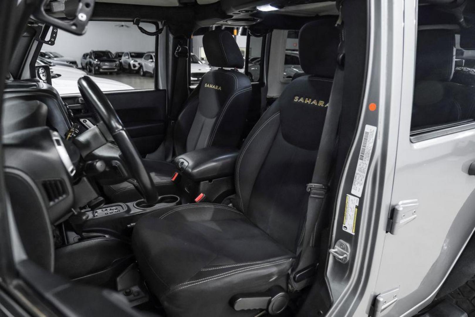 2013 Billet Metallic Clearcoat /Black Interior Jeep Wrangler Unlimited Sahara (1C4BJWEG8DL) with an 3.6L V6 24V VVT engine, Automatic transmission, located at 15300 Midway Rd., Addison, TX, 75001, (972) 702-0011, 32.958321, -96.838074 - Photo#30