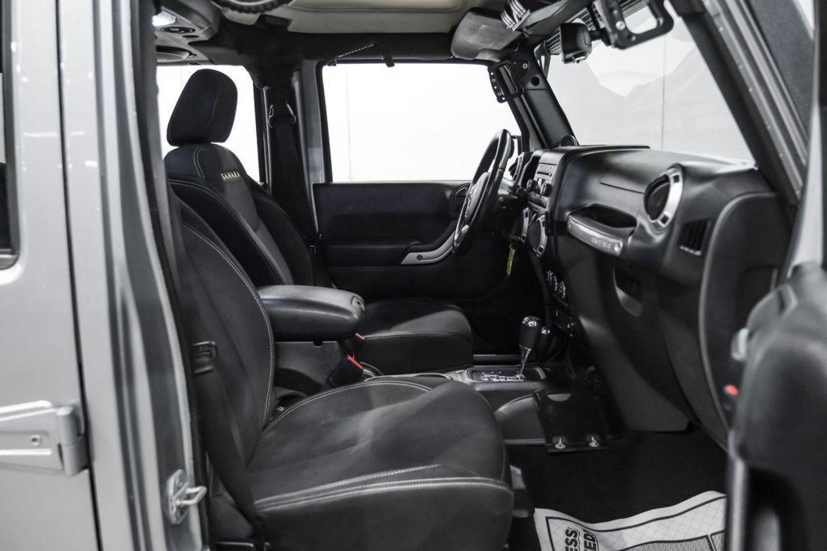 2013 Billet Metallic Clearcoat /Black Interior Jeep Wrangler Unlimited Sahara (1C4BJWEG8DL) with an 3.6L V6 24V VVT engine, Automatic transmission, located at 15300 Midway Rd., Addison, TX, 75001, (972) 702-0011, 32.958321, -96.838074 - Photo#32