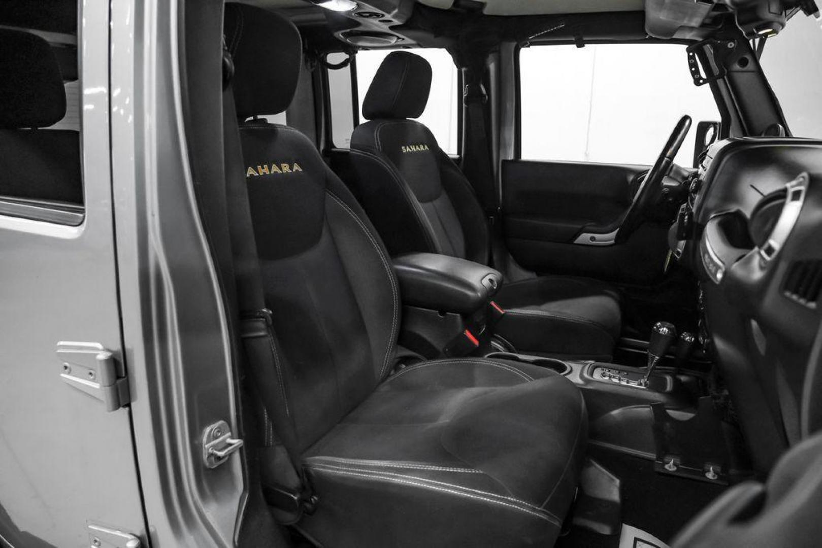 2013 Billet Metallic Clearcoat /Black Interior Jeep Wrangler Unlimited Sahara (1C4BJWEG8DL) with an 3.6L V6 24V VVT engine, Automatic transmission, located at 15300 Midway Rd., Addison, TX, 75001, (972) 702-0011, 32.958321, -96.838074 - Photo#33