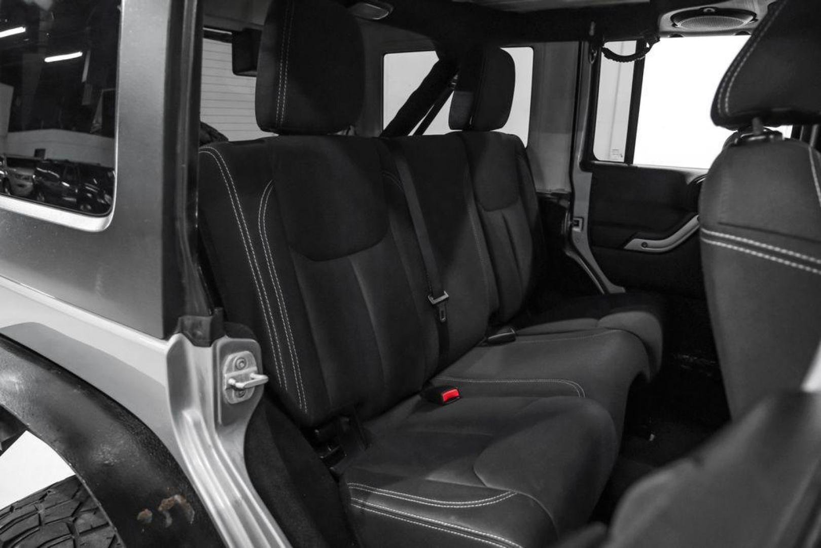 2013 Billet Metallic Clearcoat /Black Interior Jeep Wrangler Unlimited Sahara (1C4BJWEG8DL) with an 3.6L V6 24V VVT engine, Automatic transmission, located at 15300 Midway Rd., Addison, TX, 75001, (972) 702-0011, 32.958321, -96.838074 - Photo#34