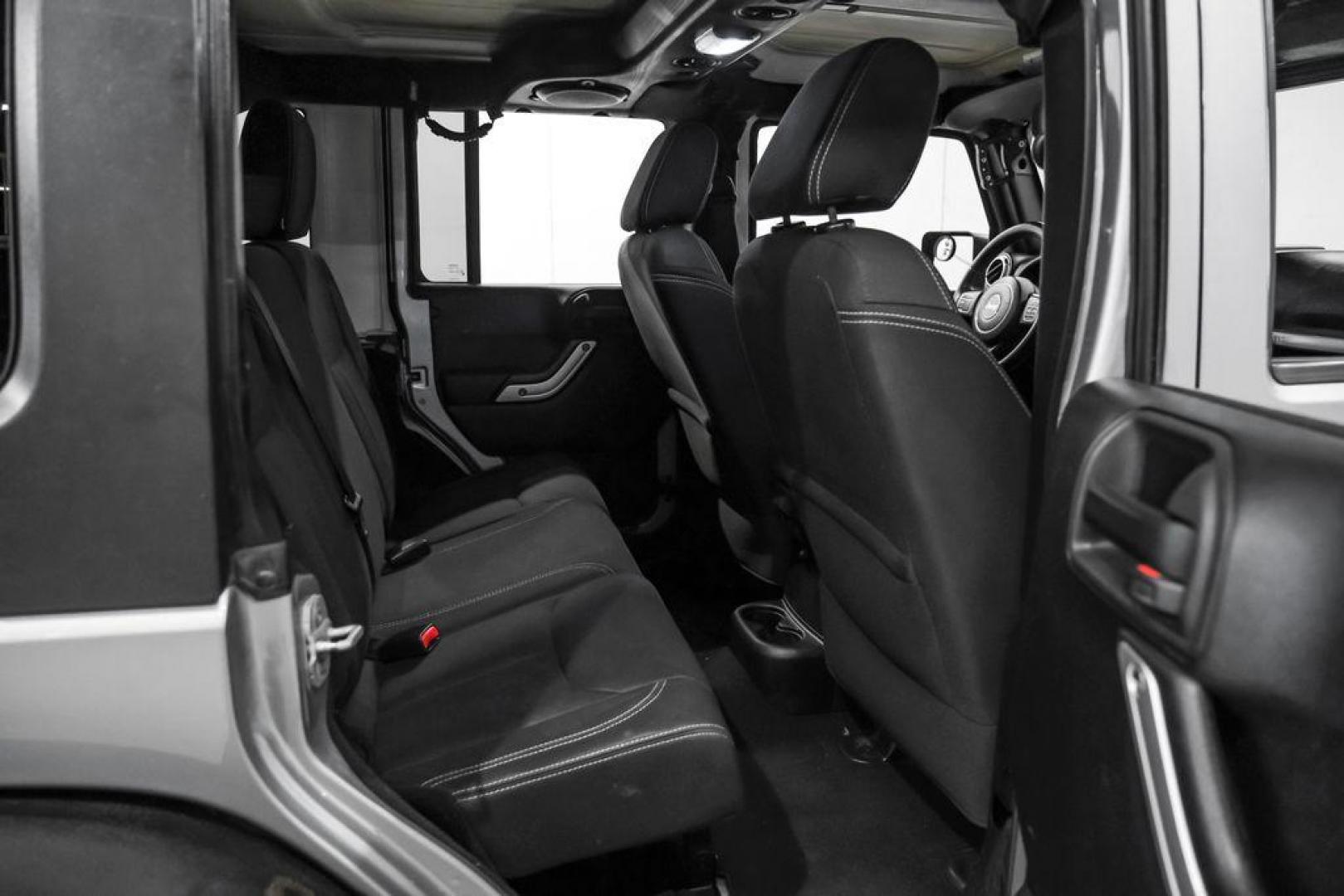 2013 Billet Metallic Clearcoat /Black Interior Jeep Wrangler Unlimited Sahara (1C4BJWEG8DL) with an 3.6L V6 24V VVT engine, Automatic transmission, located at 15300 Midway Rd., Addison, TX, 75001, (972) 702-0011, 32.958321, -96.838074 - Photo#35