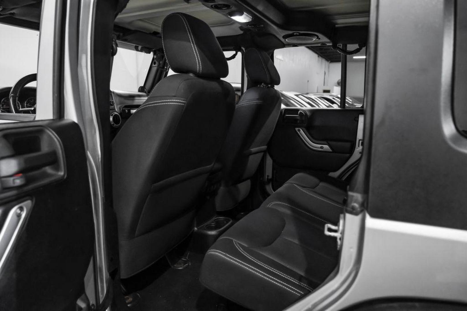 2013 Billet Metallic Clearcoat /Black Interior Jeep Wrangler Unlimited Sahara (1C4BJWEG8DL) with an 3.6L V6 24V VVT engine, Automatic transmission, located at 15300 Midway Rd., Addison, TX, 75001, (972) 702-0011, 32.958321, -96.838074 - Photo#36