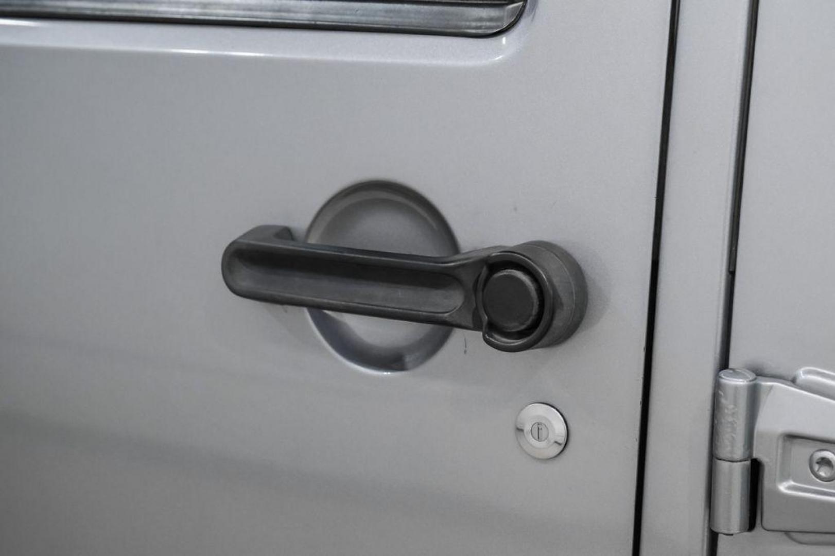 2013 Billet Metallic Clearcoat /Black Interior Jeep Wrangler Unlimited Sahara (1C4BJWEG8DL) with an 3.6L V6 24V VVT engine, Automatic transmission, located at 15300 Midway Rd., Addison, TX, 75001, (972) 702-0011, 32.958321, -96.838074 - Photo#38