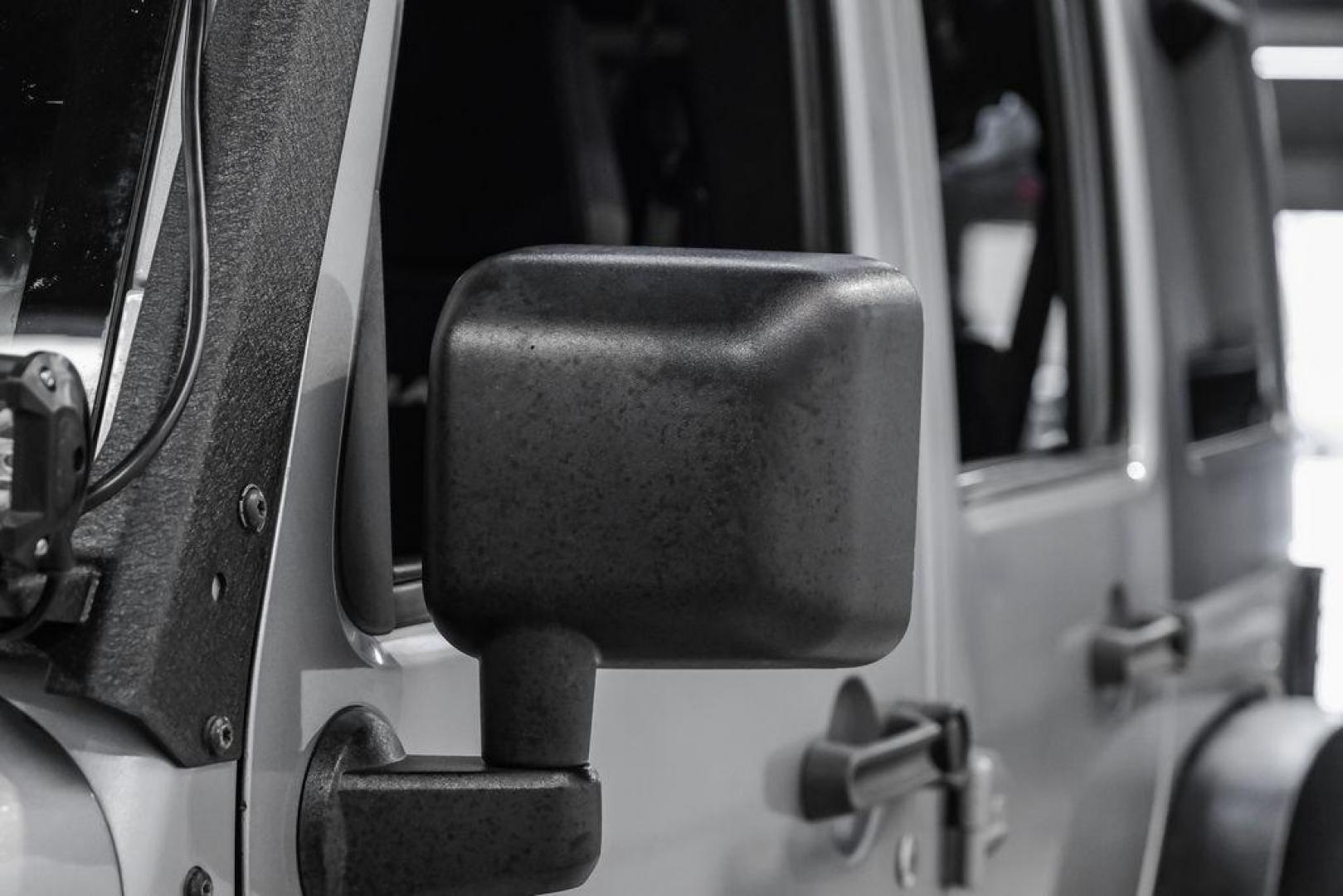 2013 Billet Metallic Clearcoat /Black Interior Jeep Wrangler Unlimited Sahara (1C4BJWEG8DL) with an 3.6L V6 24V VVT engine, Automatic transmission, located at 15300 Midway Rd., Addison, TX, 75001, (972) 702-0011, 32.958321, -96.838074 - Photo#39