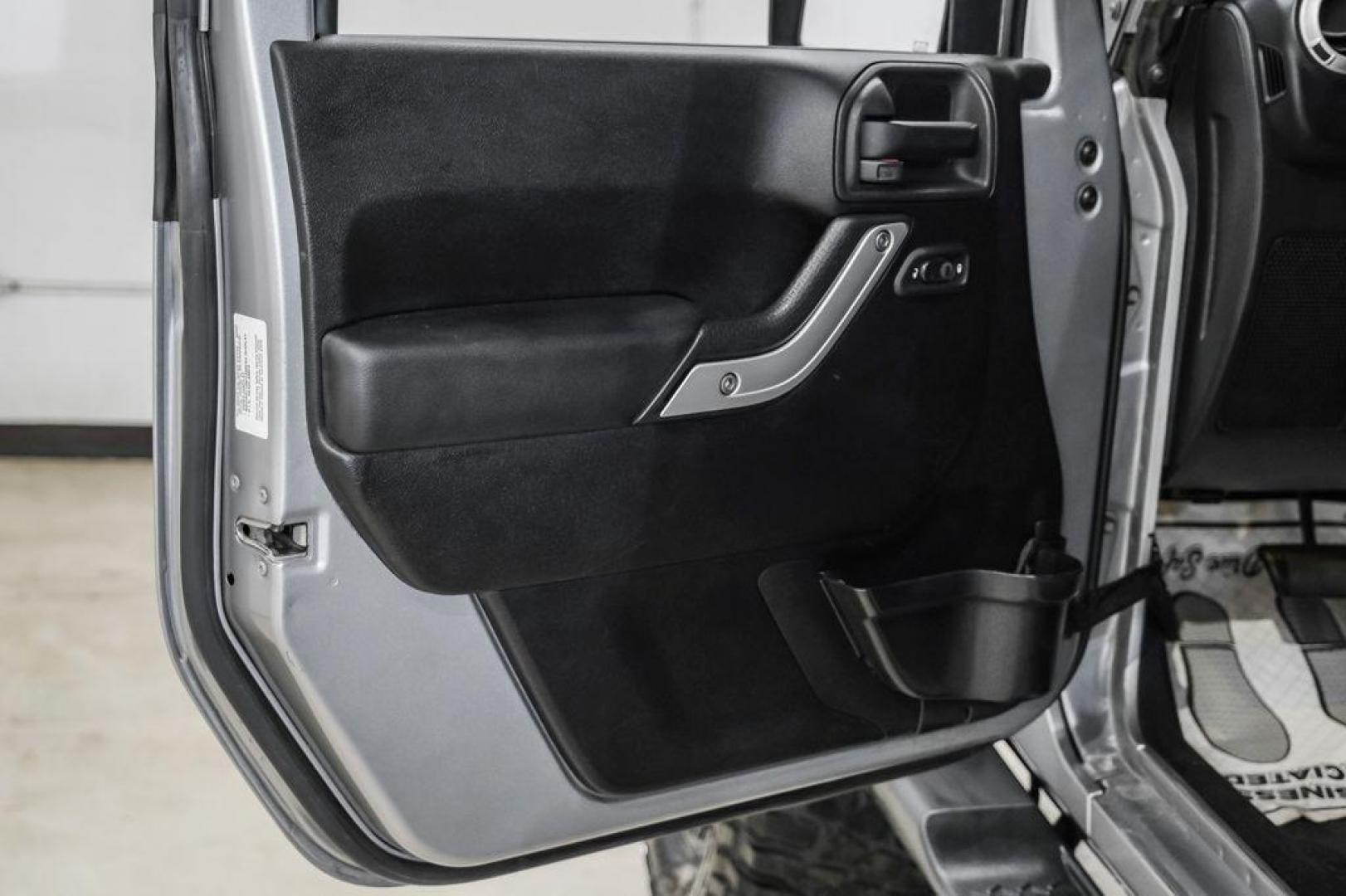 2013 Billet Metallic Clearcoat /Black Interior Jeep Wrangler Unlimited Sahara (1C4BJWEG8DL) with an 3.6L V6 24V VVT engine, Automatic transmission, located at 15300 Midway Rd., Addison, TX, 75001, (972) 702-0011, 32.958321, -96.838074 - Photo#41