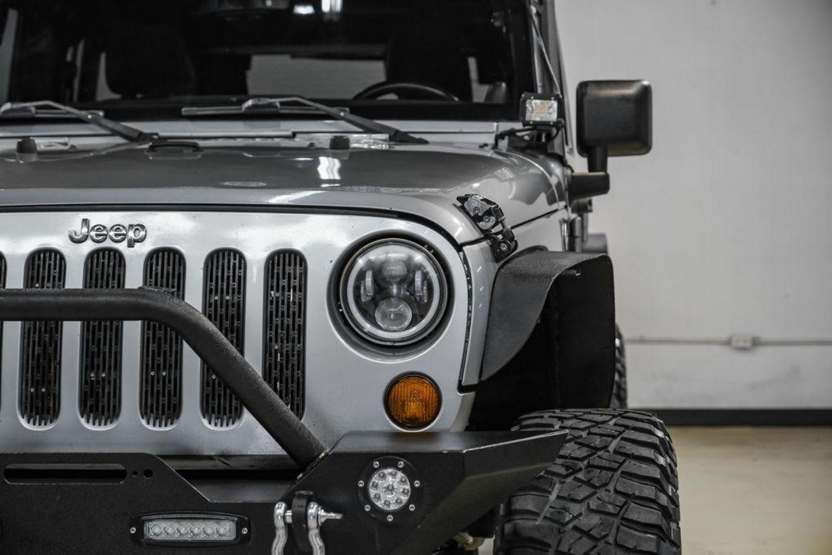 2013 Billet Metallic Clearcoat /Black Interior Jeep Wrangler Unlimited Sahara (1C4BJWEG8DL) with an 3.6L V6 24V VVT engine, Automatic transmission, located at 15300 Midway Rd., Addison, TX, 75001, (972) 702-0011, 32.958321, -96.838074 - Photo#45