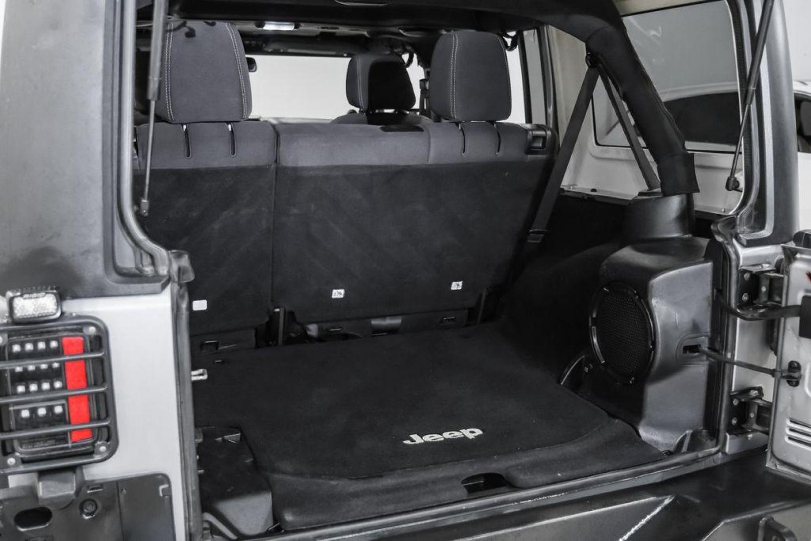 2013 Billet Metallic Clearcoat /Black Interior Jeep Wrangler Unlimited Sahara (1C4BJWEG8DL) with an 3.6L V6 24V VVT engine, Automatic transmission, located at 15300 Midway Rd., Addison, TX, 75001, (972) 702-0011, 32.958321, -96.838074 - Photo#51