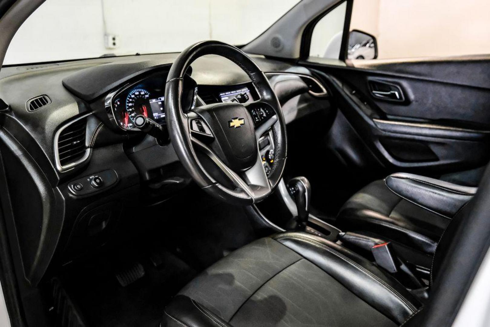 2020 Summit White /Jet Black Chevrolet Trax LT (KL7CJLSB6LB) with an ECOTEC 1.4L I4 SMPI DOHC Turbocharged VVT engine, Automatic transmission, located at 15300 Midway Rd., Addison, TX, 75001, (972) 702-0011, 32.958321, -96.838074 - Photo#2