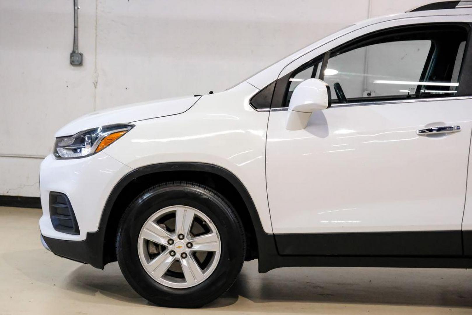 2020 Summit White /Jet Black Chevrolet Trax LT (KL7CJLSB6LB) with an ECOTEC 1.4L I4 SMPI DOHC Turbocharged VVT engine, Automatic transmission, located at 15300 Midway Rd., Addison, TX, 75001, (972) 702-0011, 32.958321, -96.838074 - Photo#11