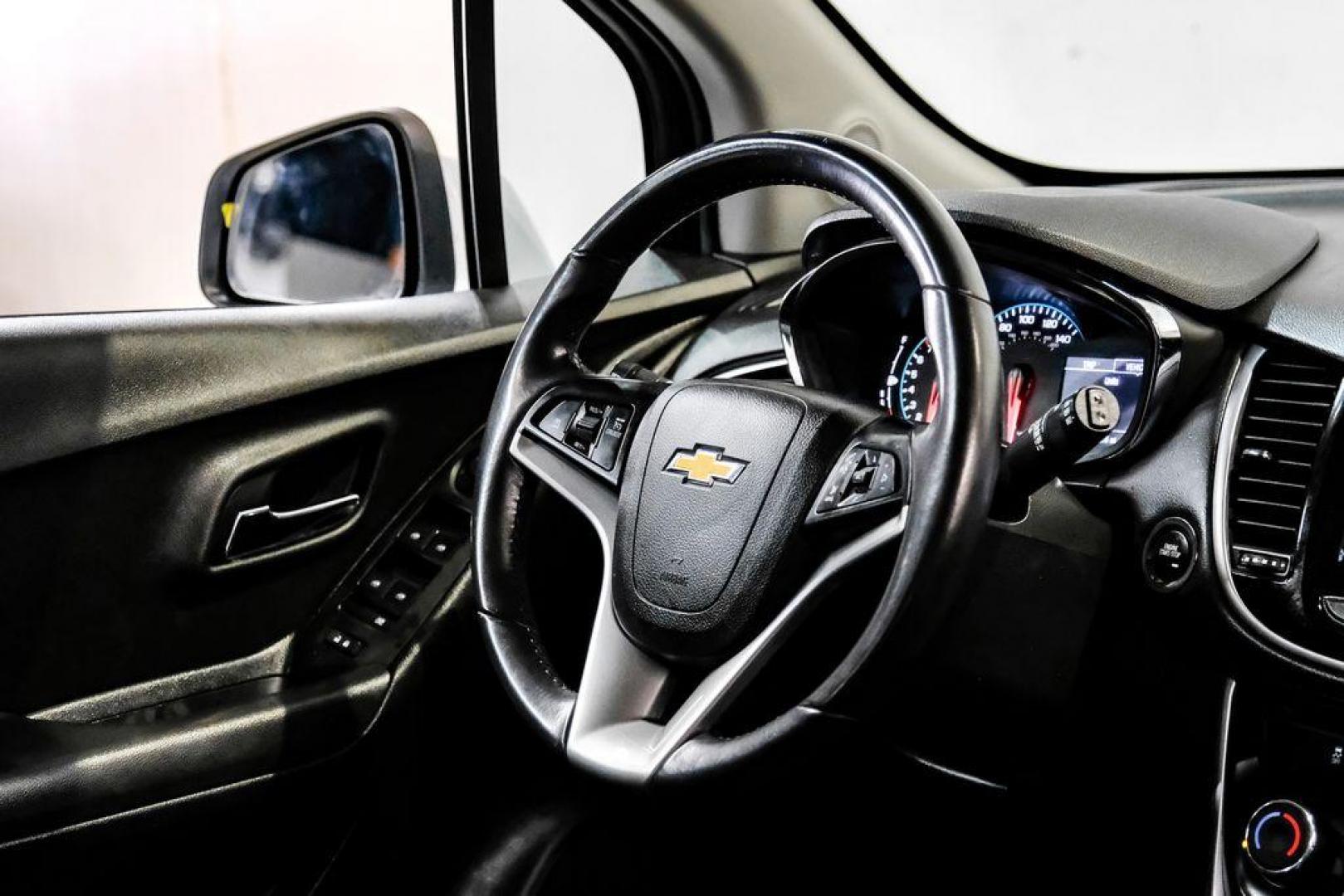 2020 Summit White /Jet Black Chevrolet Trax LT (KL7CJLSB6LB) with an ECOTEC 1.4L I4 SMPI DOHC Turbocharged VVT engine, Automatic transmission, located at 15300 Midway Rd., Addison, TX, 75001, (972) 702-0011, 32.958321, -96.838074 - Photo#14