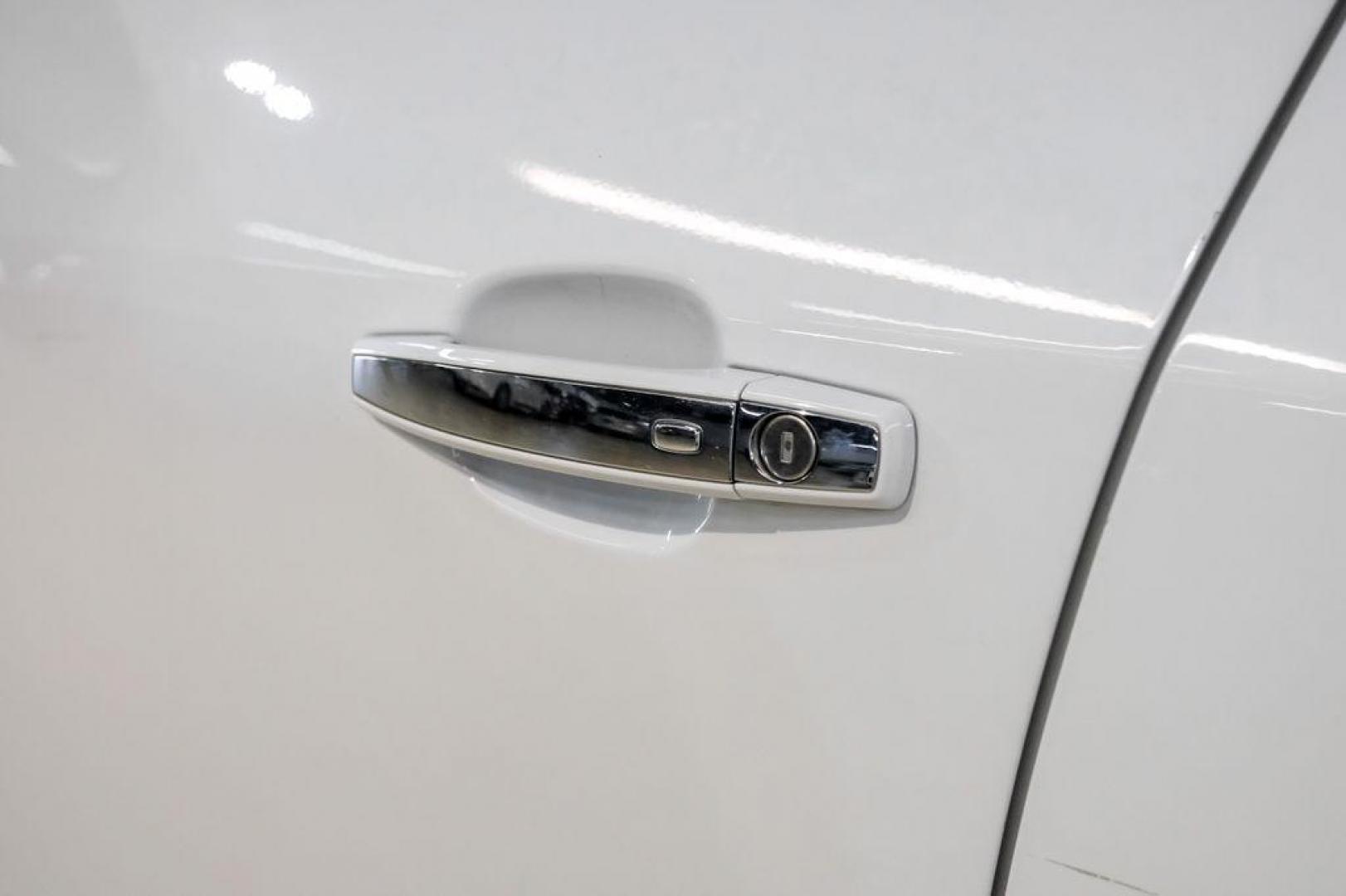 2020 Summit White /Jet Black Chevrolet Trax LT (KL7CJLSB6LB) with an ECOTEC 1.4L I4 SMPI DOHC Turbocharged VVT engine, Automatic transmission, located at 15300 Midway Rd., Addison, TX, 75001, (972) 702-0011, 32.958321, -96.838074 - Photo#37