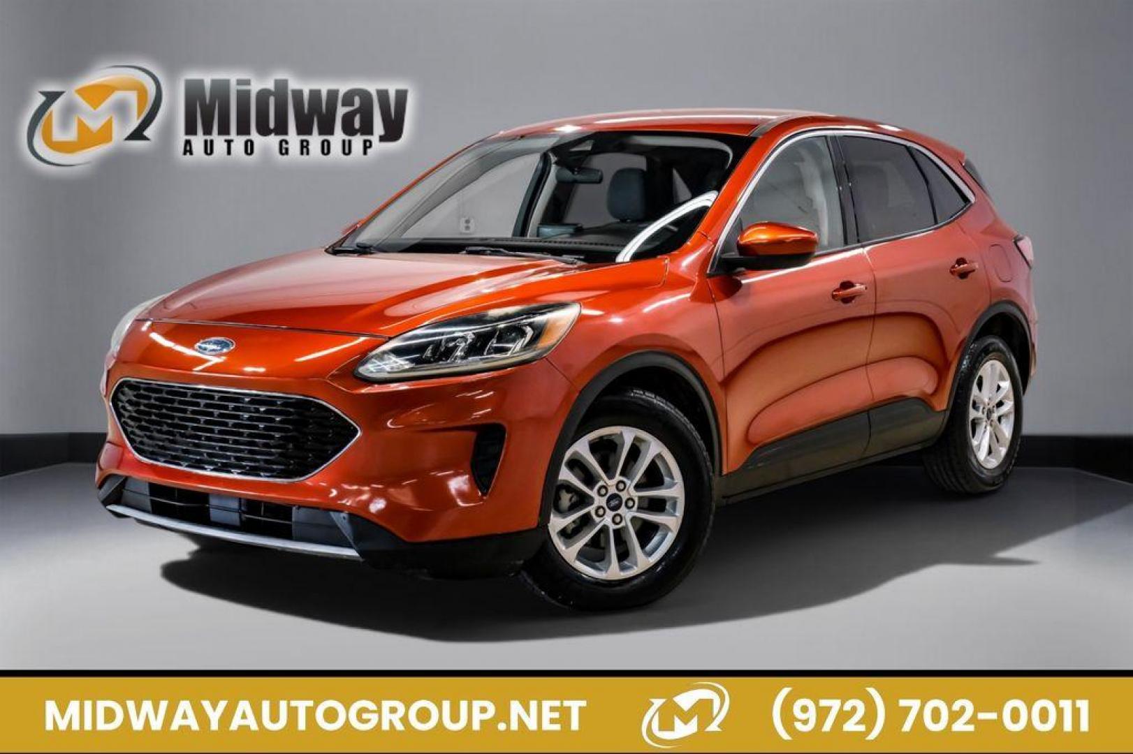 2020 Orange Metallic /Dark Earth Gray Ford Escape SE (1FMCU0G62LU) with an 1.5L EcoBoost engine, Automatic transmission, located at 15300 Midway Rd., Addison, TX, 75001, (972) 702-0011, 32.958321, -96.838074 - Photo#0