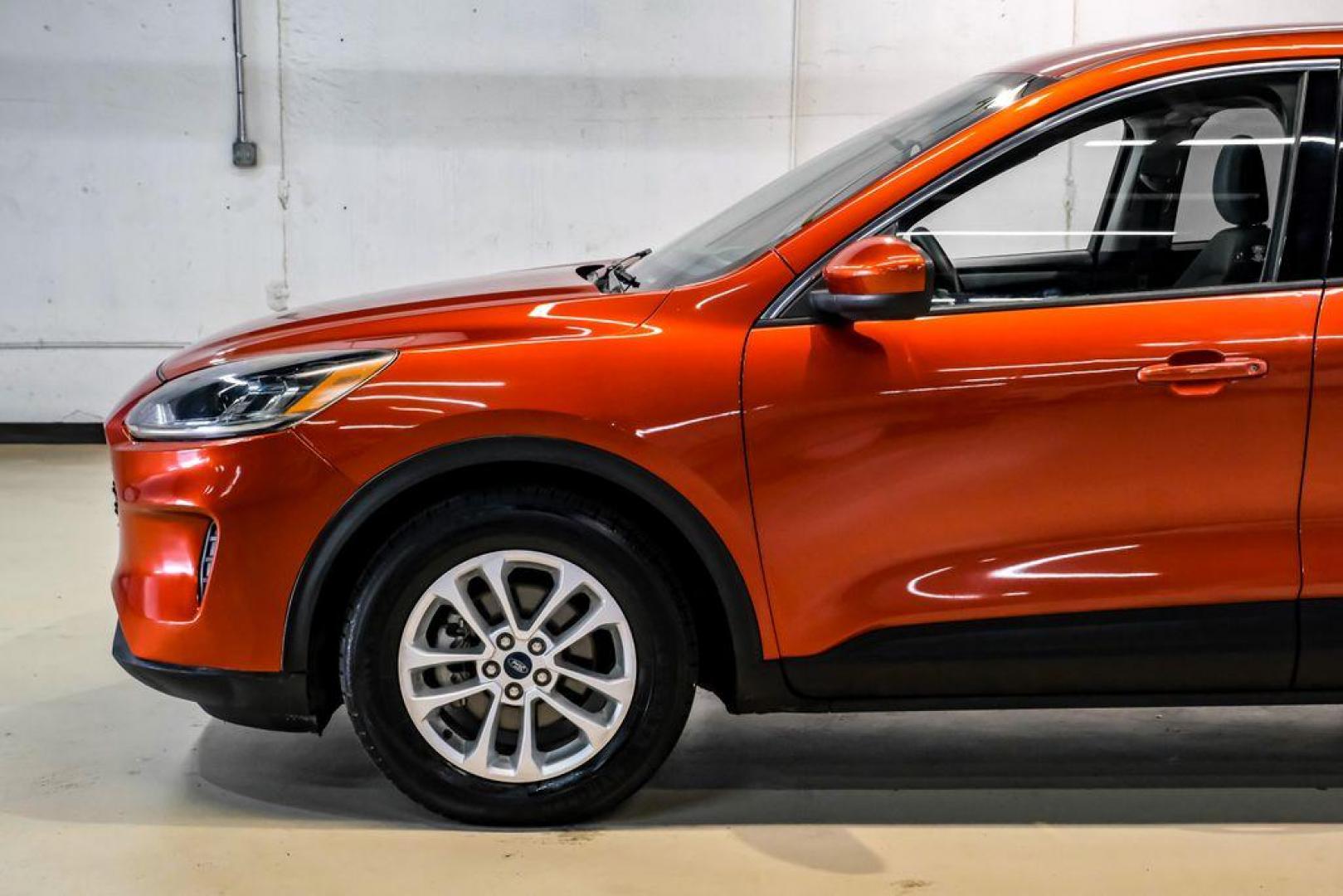 2020 Orange Metallic /Dark Earth Gray Ford Escape SE (1FMCU0G62LU) with an 1.5L EcoBoost engine, Automatic transmission, located at 15300 Midway Rd., Addison, TX, 75001, (972) 702-0011, 32.958321, -96.838074 - Photo#11