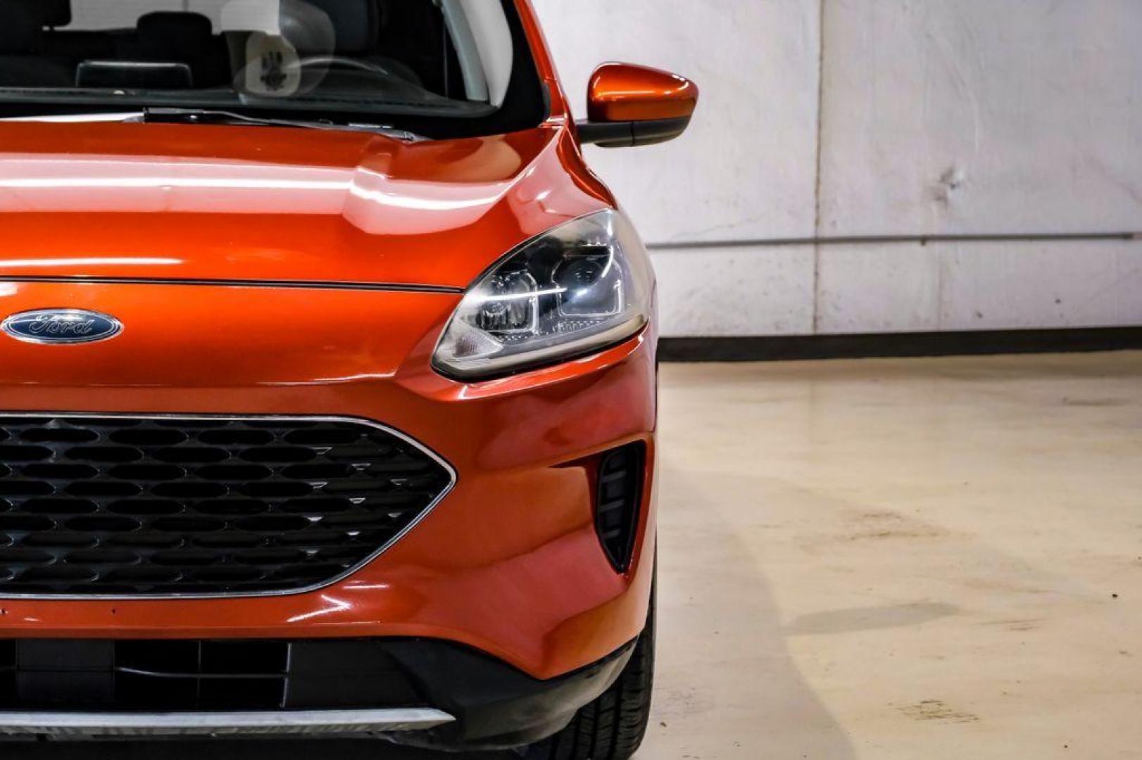 2020 Orange Metallic /Dark Earth Gray Ford Escape SE (1FMCU0G62LU) with an 1.5L EcoBoost engine, Automatic transmission, located at 15300 Midway Rd., Addison, TX, 75001, (972) 702-0011, 32.958321, -96.838074 - Photo#43