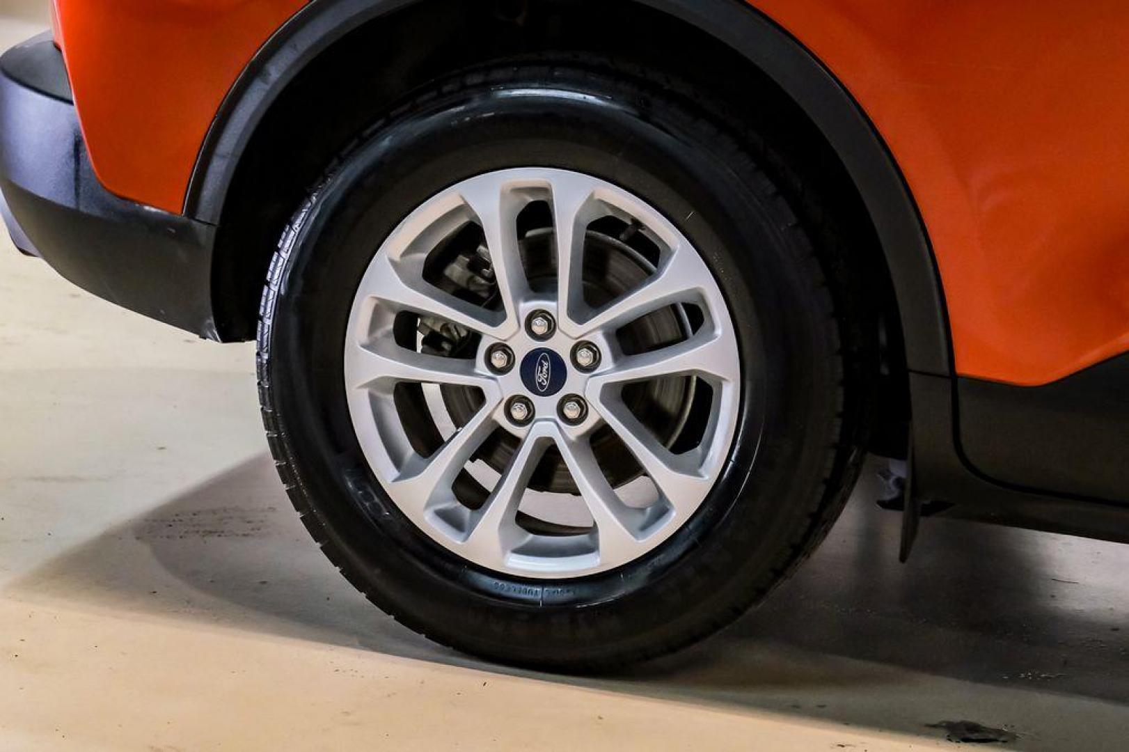 2020 Orange Metallic /Dark Earth Gray Ford Escape SE (1FMCU0G62LU) with an 1.5L EcoBoost engine, Automatic transmission, located at 15300 Midway Rd., Addison, TX, 75001, (972) 702-0011, 32.958321, -96.838074 - Photo#50