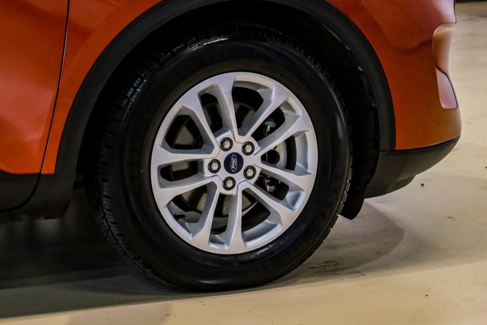 2020 Orange Metallic /Dark Earth Gray Ford Escape SE (1FMCU0G62LU) with an 1.5L EcoBoost engine, Automatic transmission, located at 15300 Midway Rd., Addison, TX, 75001, (972) 702-0011, 32.958321, -96.838074 - Photo#51