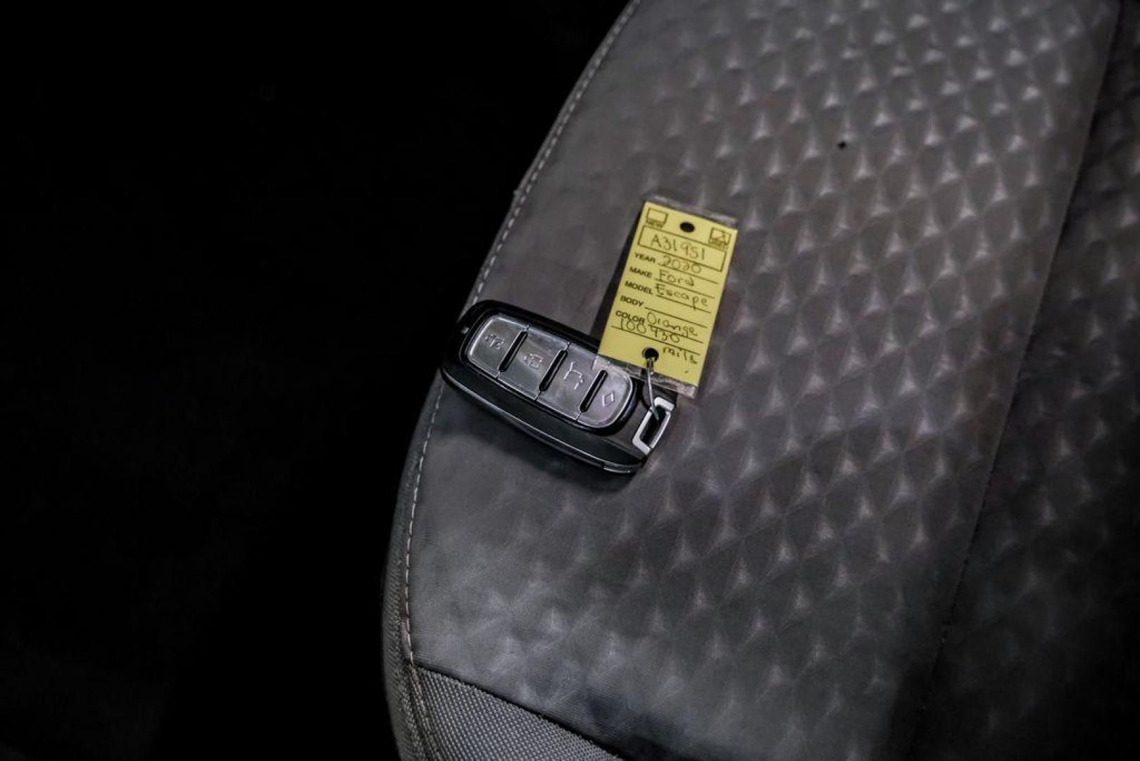 2020 Orange Metallic /Dark Earth Gray Ford Escape SE (1FMCU0G62LU) with an 1.5L EcoBoost engine, Automatic transmission, located at 15300 Midway Rd., Addison, TX, 75001, (972) 702-0011, 32.958321, -96.838074 - Photo#54