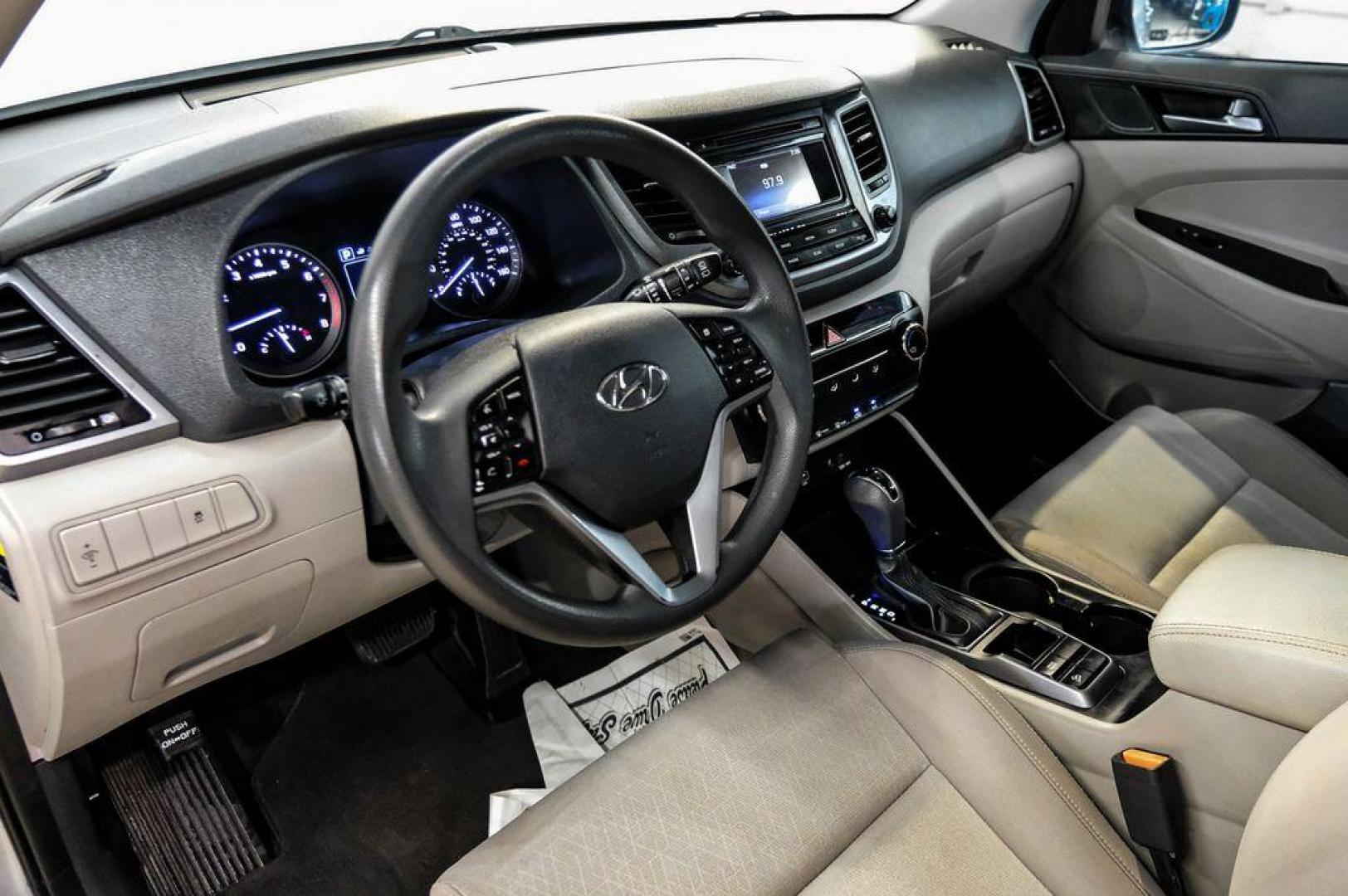 2016 Molten Silver /Gray Hyundai Tucson Eco (KM8J33A28GU) with an 1.6L I4 DGI Turbocharged DOHC 16V ULEV II 175hp engine, Automatic transmission, located at 15300 Midway Rd., Addison, TX, 75001, (972) 702-0011, 32.958321, -96.838074 - Photo#2