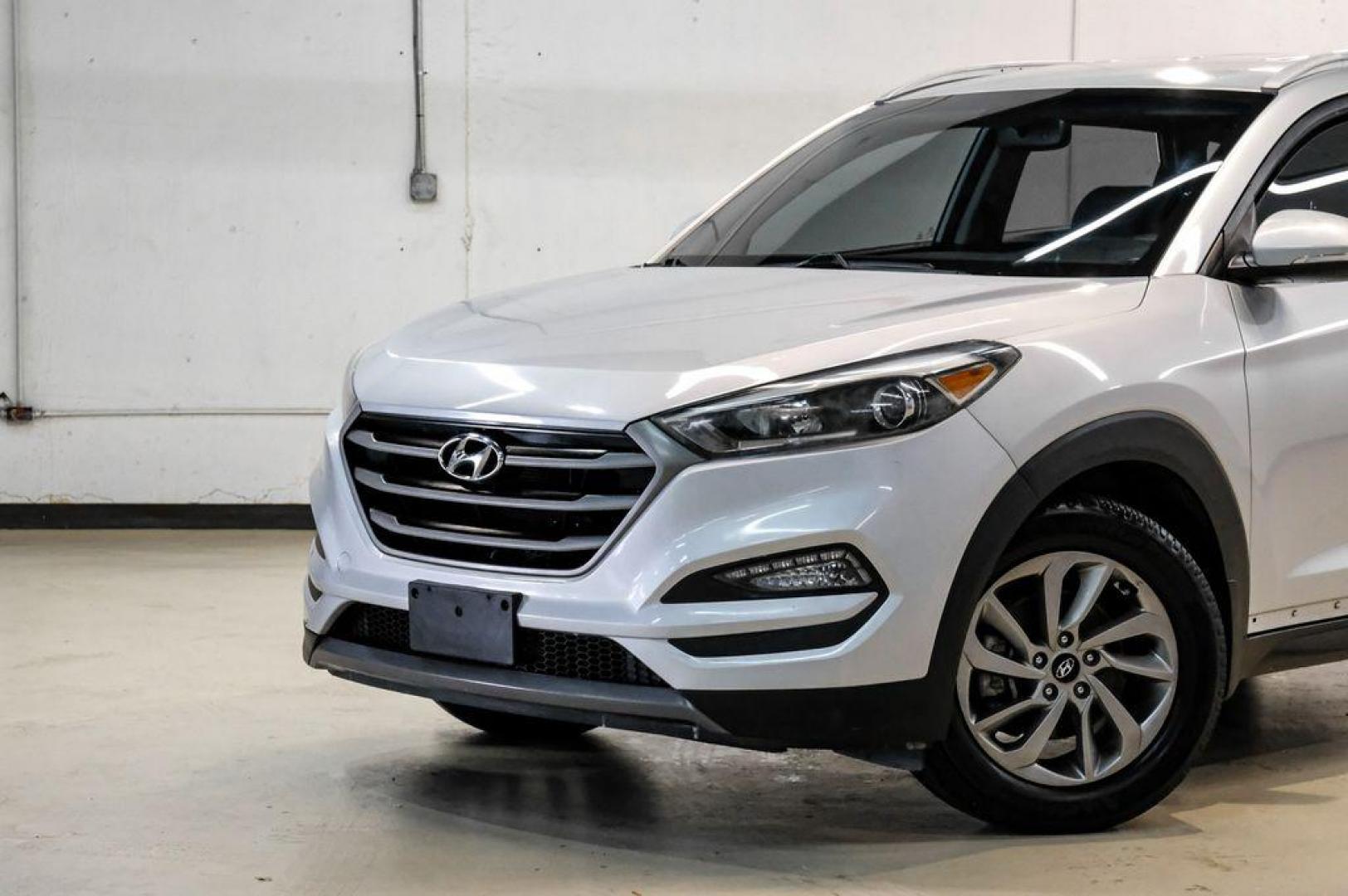 2016 Molten Silver /Gray Hyundai Tucson Eco (KM8J33A28GU) with an 1.6L I4 DGI Turbocharged DOHC 16V ULEV II 175hp engine, Automatic transmission, located at 15300 Midway Rd., Addison, TX, 75001, (972) 702-0011, 32.958321, -96.838074 - Photo#4