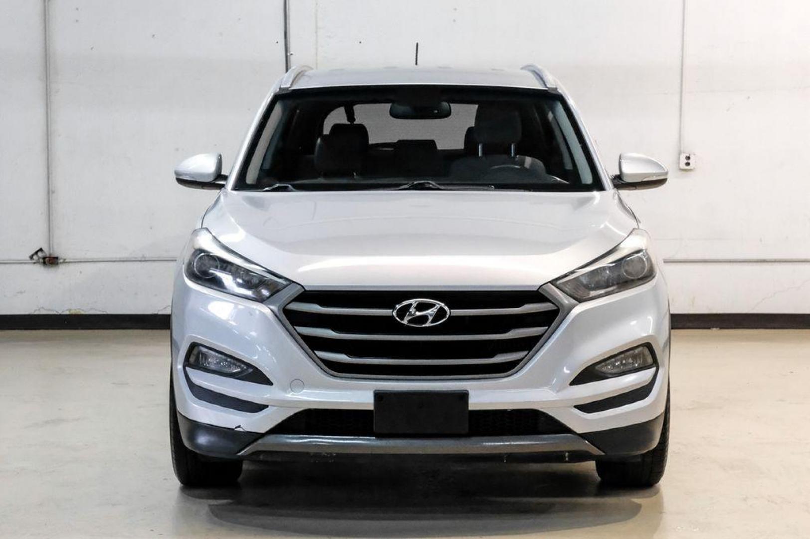 2016 Molten Silver /Gray Hyundai Tucson Eco (KM8J33A28GU) with an 1.6L I4 DGI Turbocharged DOHC 16V ULEV II 175hp engine, Automatic transmission, located at 15300 Midway Rd., Addison, TX, 75001, (972) 702-0011, 32.958321, -96.838074 - Photo#6
