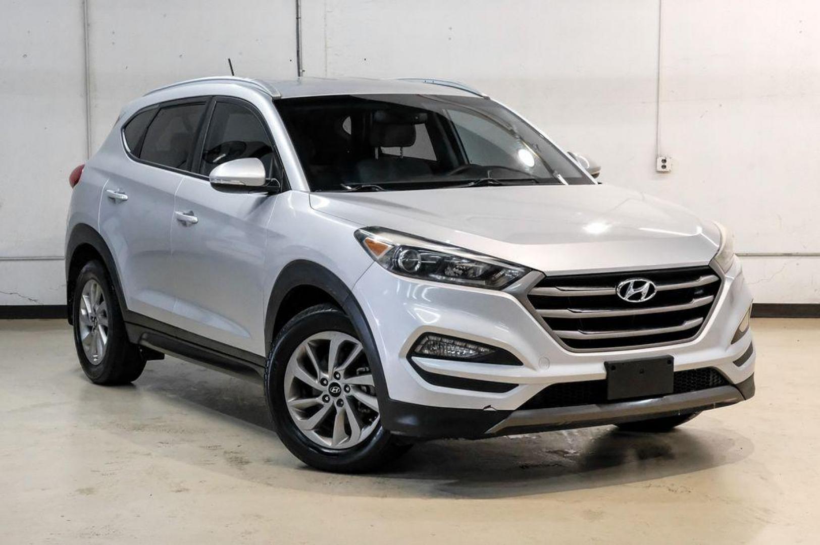 2016 Molten Silver /Gray Hyundai Tucson Eco (KM8J33A28GU) with an 1.6L I4 DGI Turbocharged DOHC 16V ULEV II 175hp engine, Automatic transmission, located at 15300 Midway Rd., Addison, TX, 75001, (972) 702-0011, 32.958321, -96.838074 - Photo#7